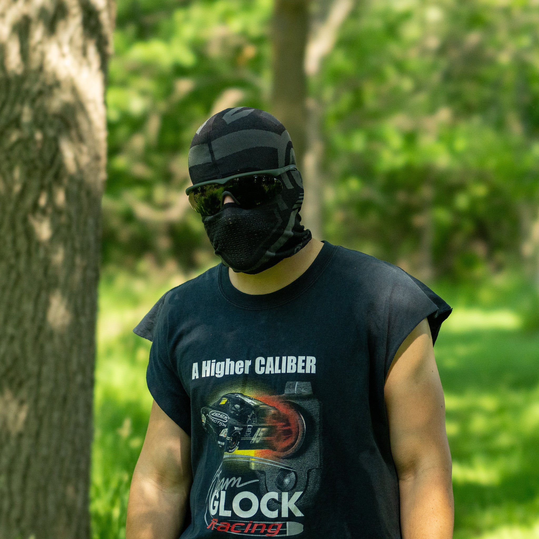 SwissEye Raptor ballistic sunglasses with wrap-around design and tinted lenses, showcasing durable frame and sporty style.