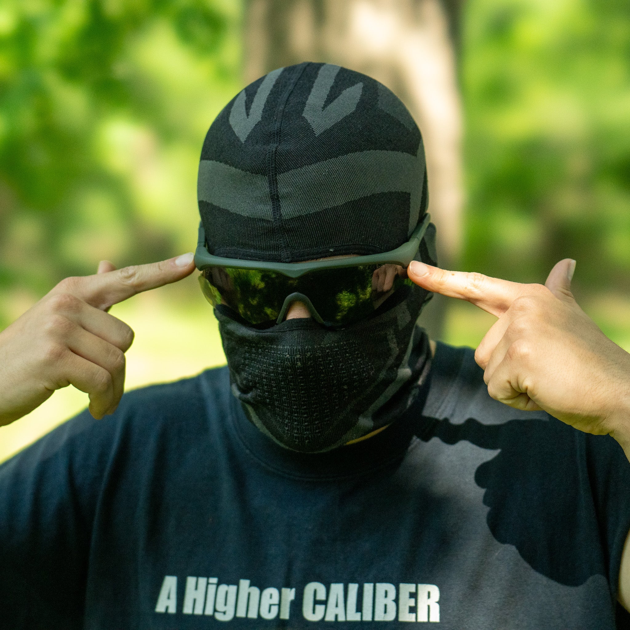 SwissEye® Raptor ballistic sunglasses with wrap-around design and dark lenses, ideal for outdoor protection.