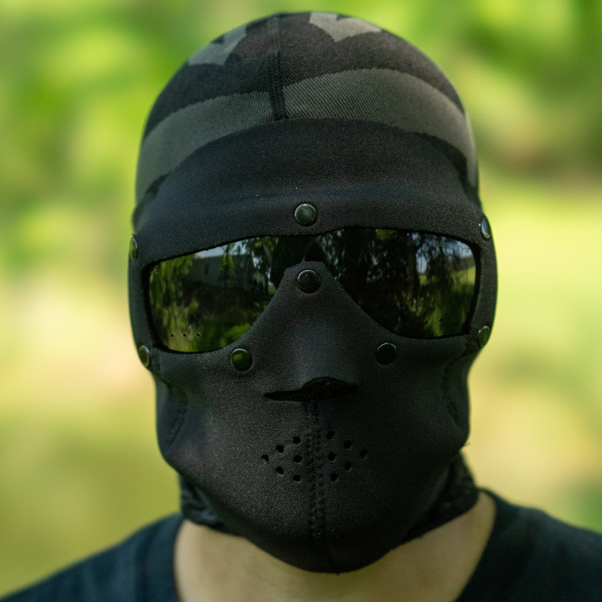 SwissEye black neoprene mask with ballistic smoke lenses, ideal for outdoor activities and protective gear.