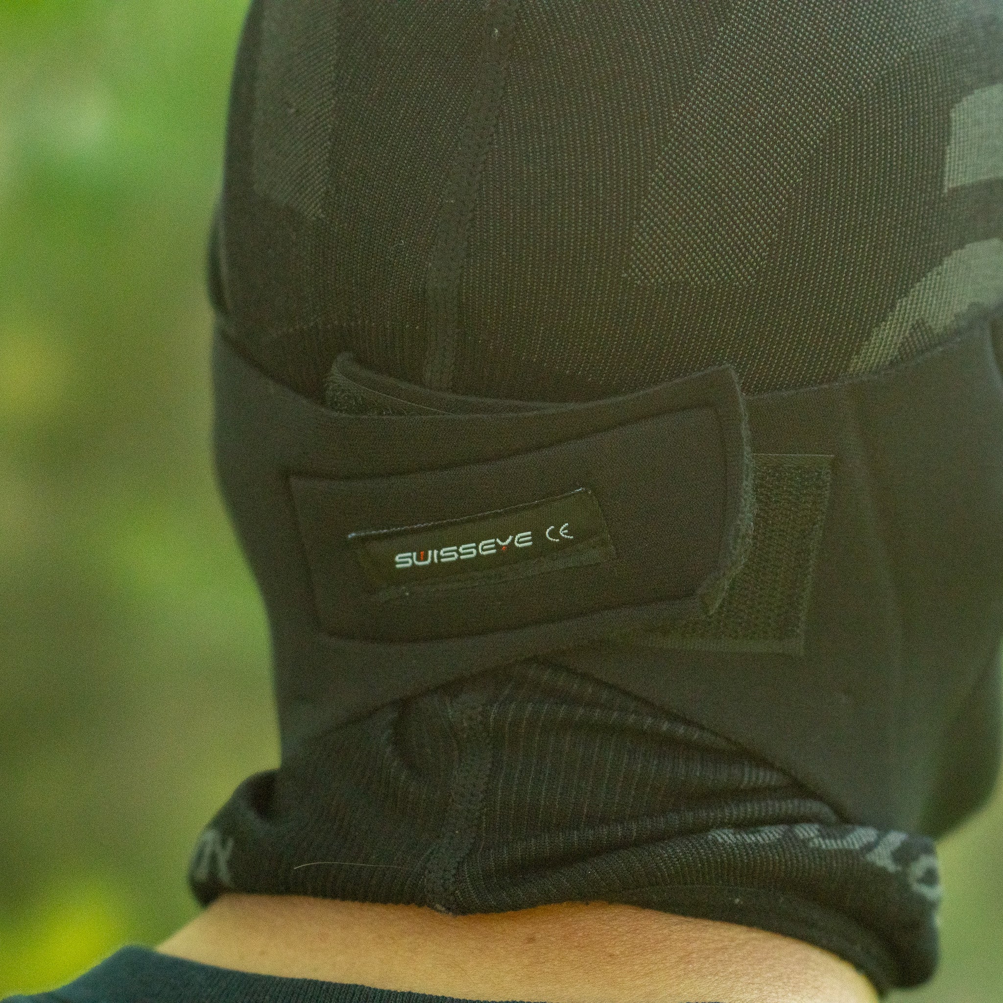 SwissEye black neoprene mask with ballistic smoke lenses, showcasing a sleek design and protective features.