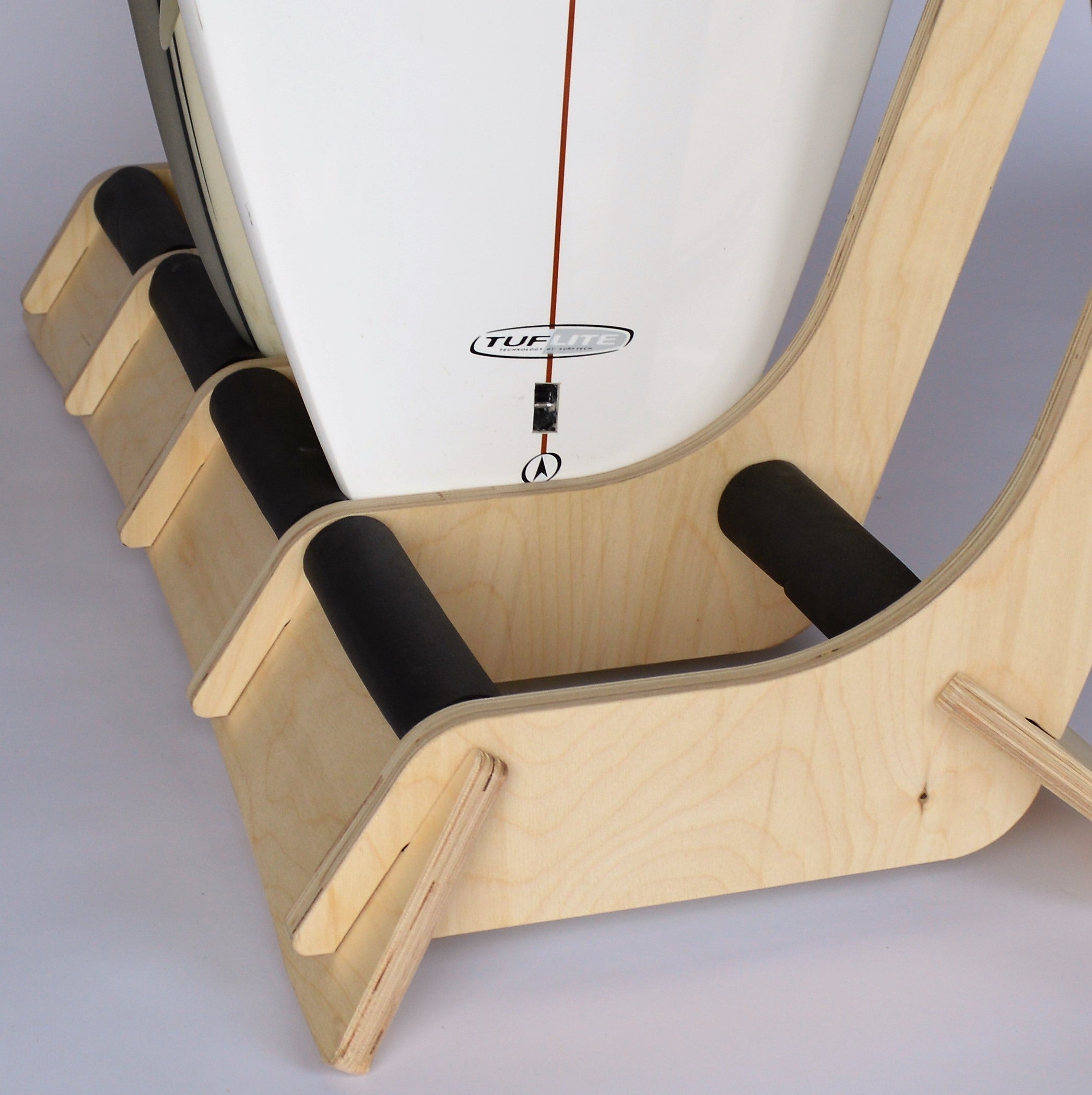 Freestanding Rado Racks surfboard rack showcasing multiple boards in an organized display.