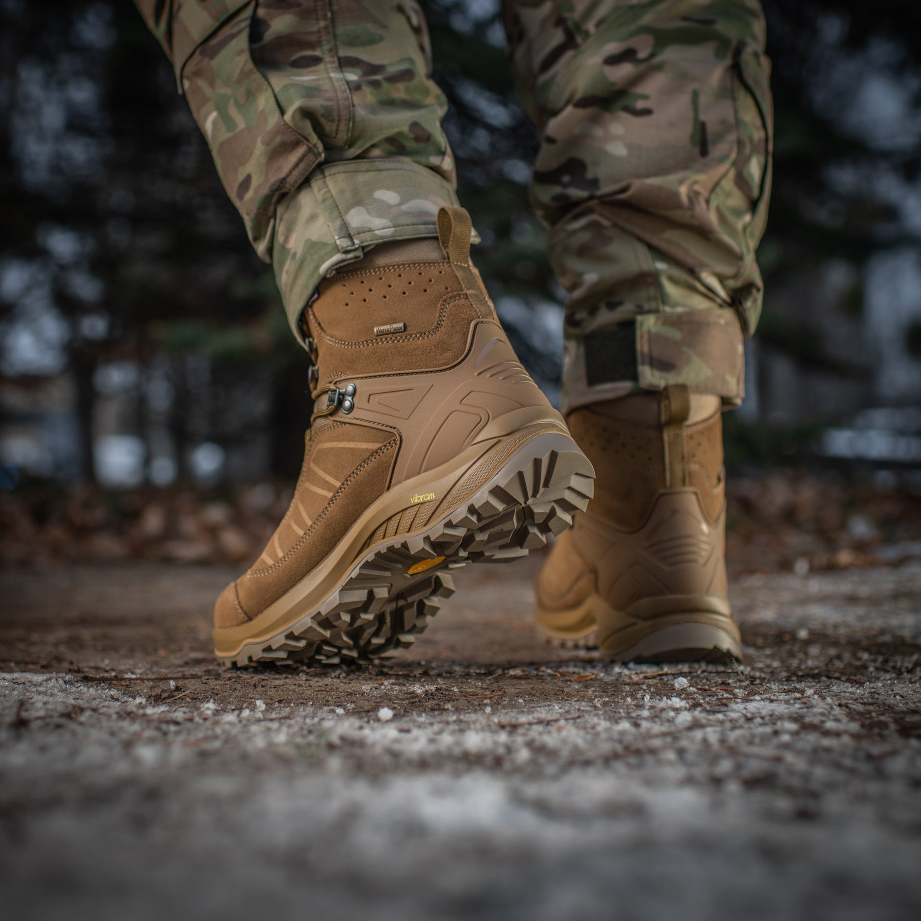 M-TAC tactical winter boots shown with durable black leather and waterproof design for cold weather outdoor use.