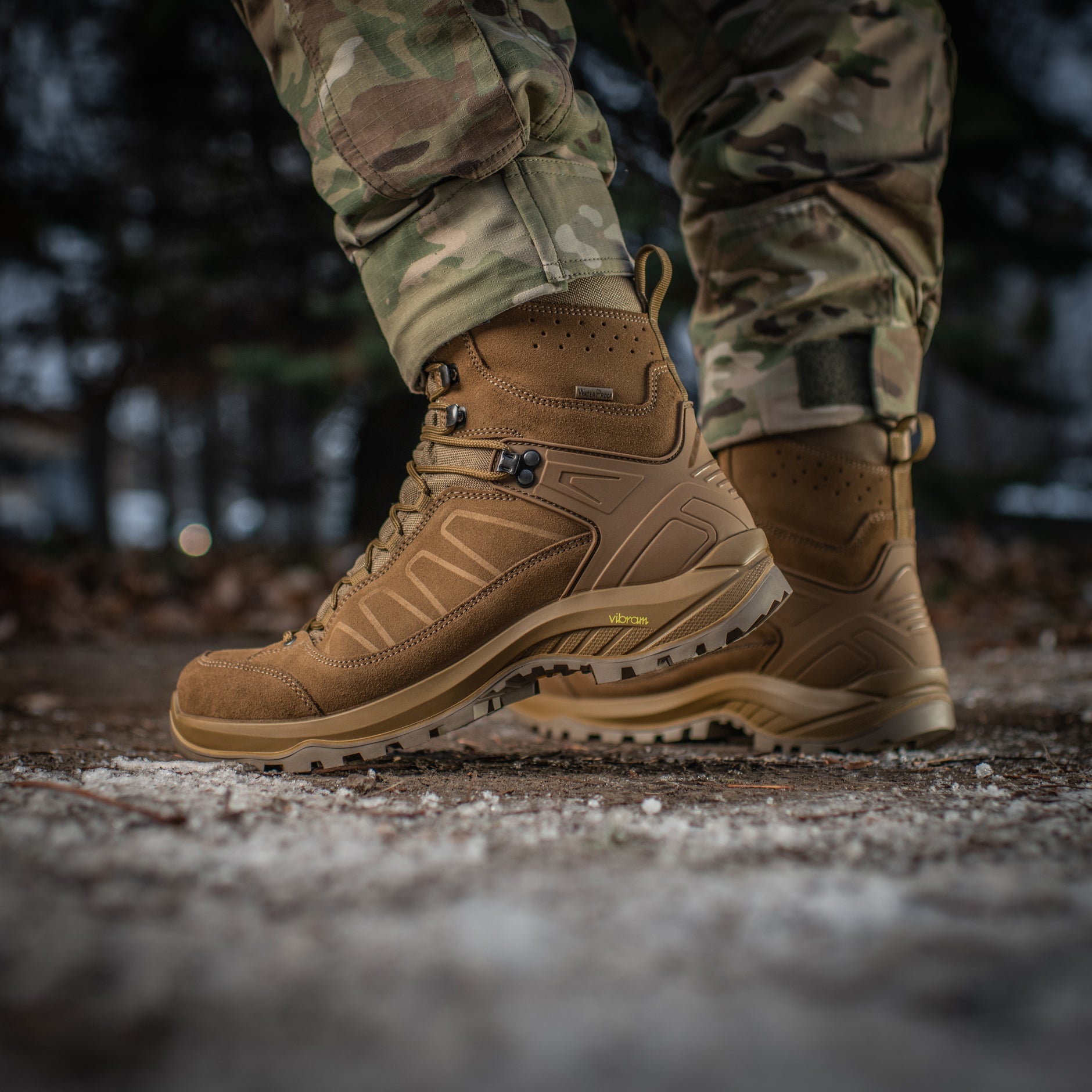 M-Tac tactical winter boots with rugged black leather and durable rubber soles, designed for cold weather and tactical use.