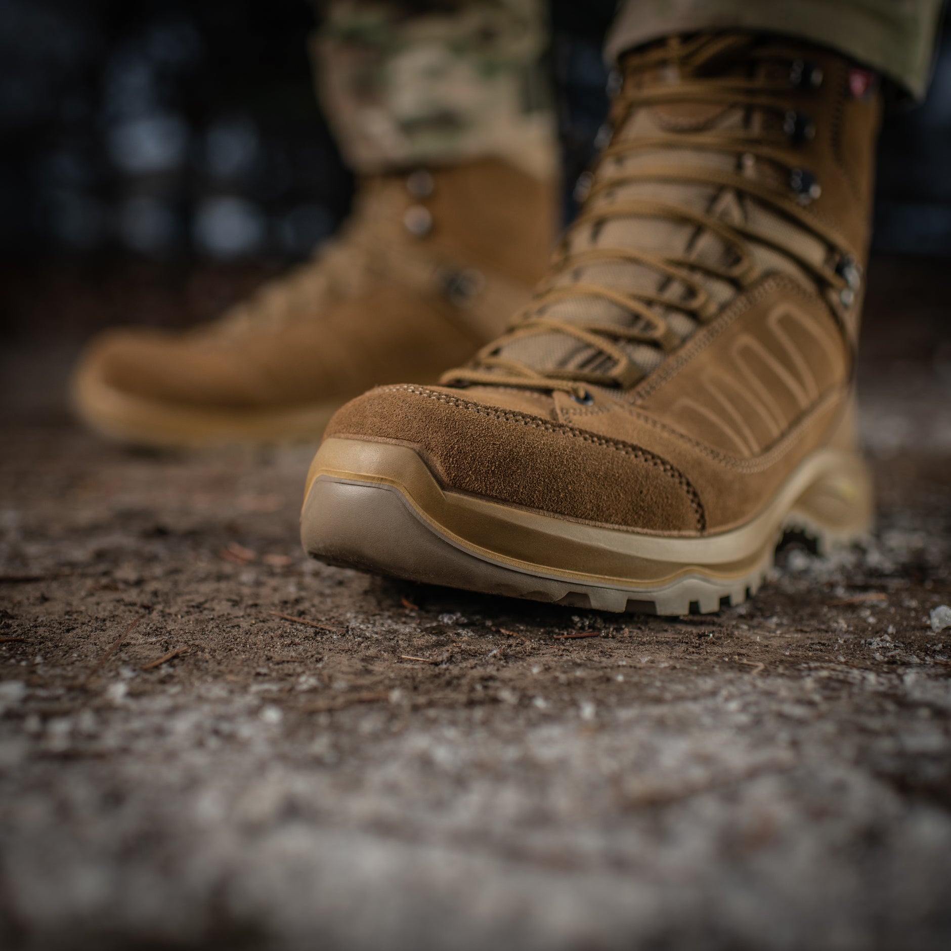 M-Tac tactical winter boots with rugged design, waterproof material, and sturdy soles suitable for cold outdoor conditions.