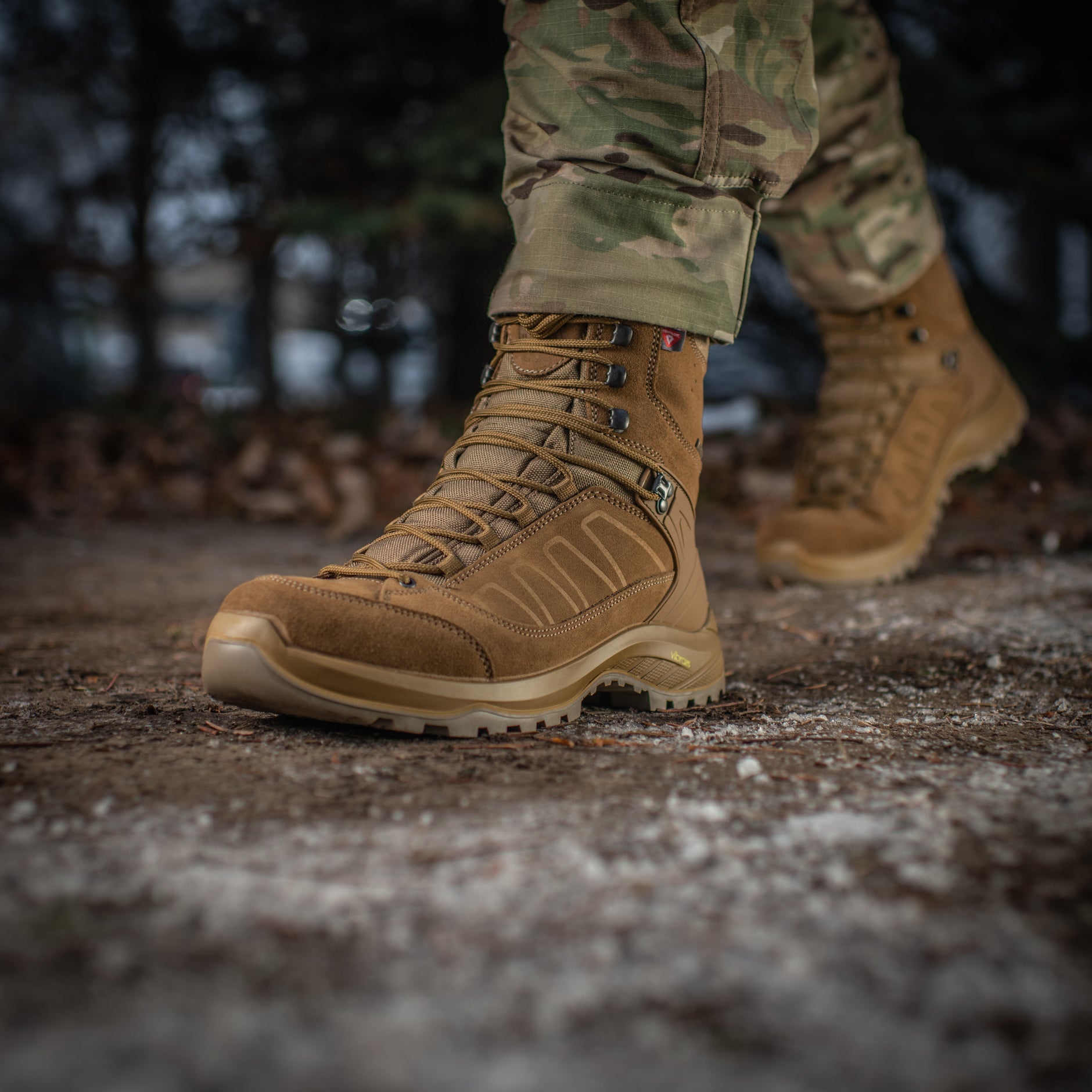 M-Tac tactical winter boots with rugged design, waterproof material, and sturdy soles for outdoor tactical and winter use.