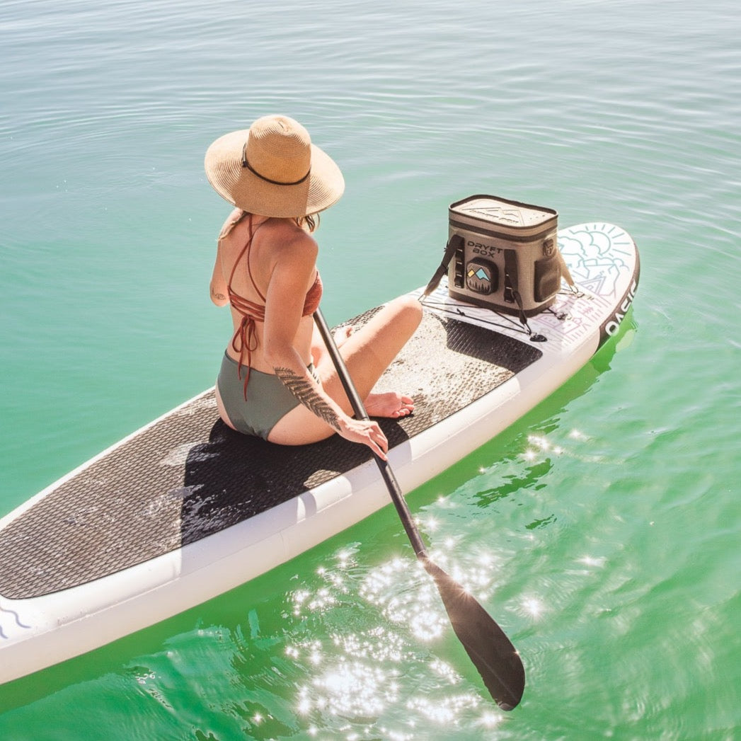 SolVida DRYFT BOX floating cooler with built-in Bluetooth speaker, water-resistant sports accessory for water activities.