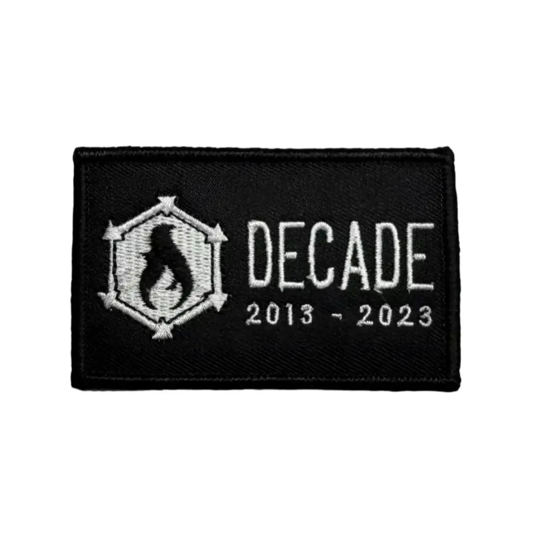 Recycled Firefighter Decade Patch featuring embroidered design on fabric, suitable for jackets or backpacks.