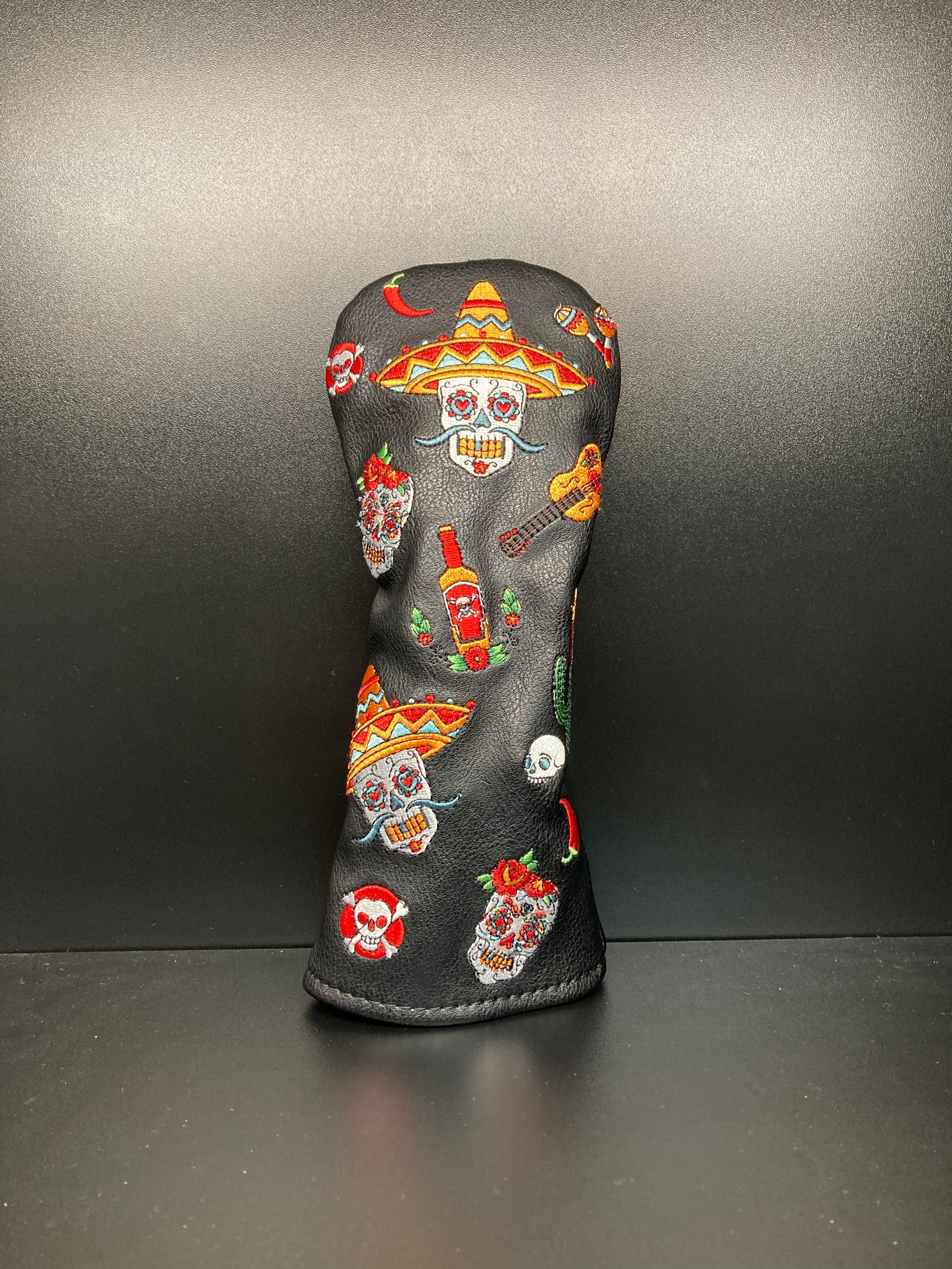 Dia de los Muertos themed golf club headcover by ParWestGolf, featuring colorful skull and floral designs.