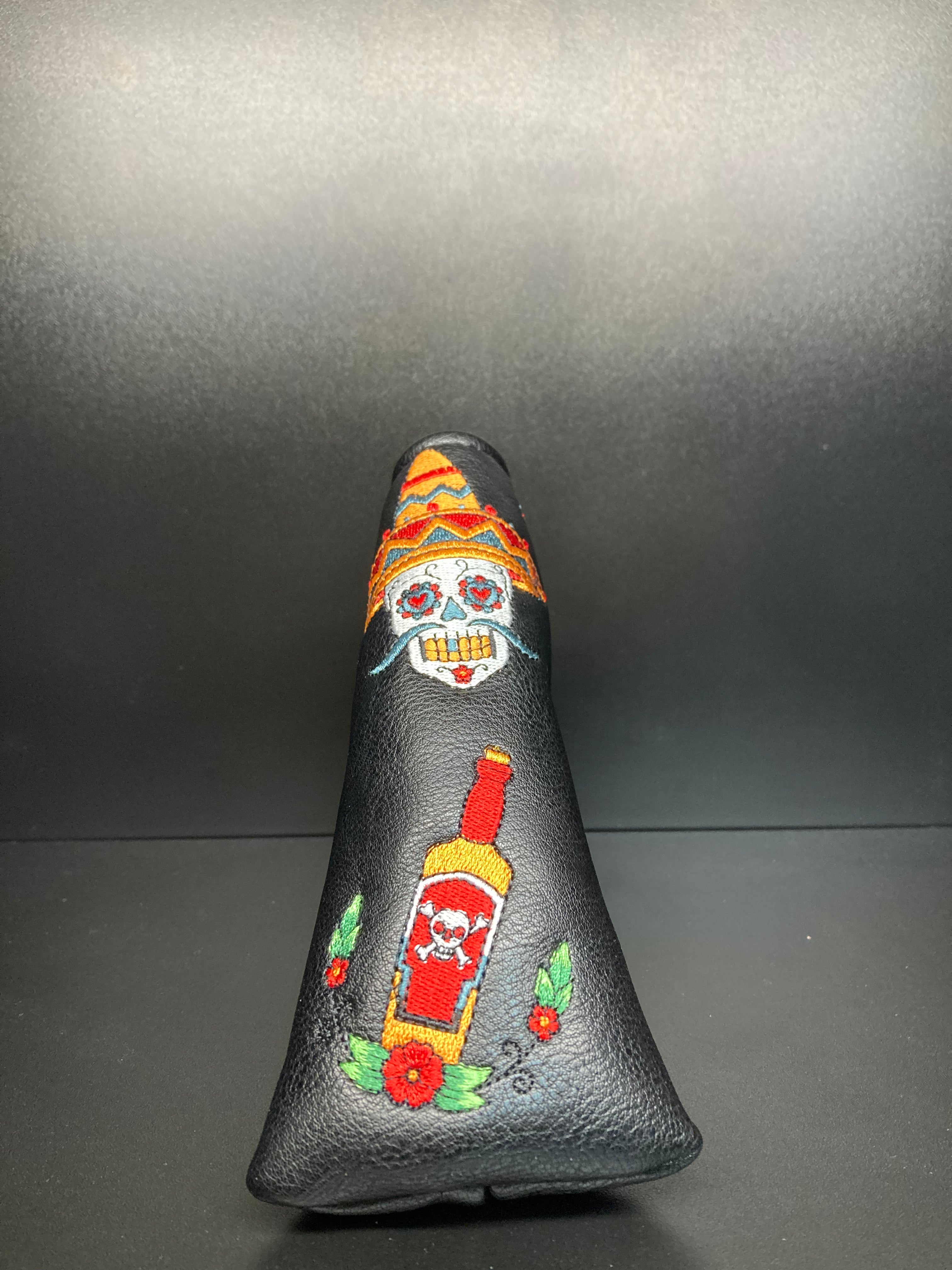 Dia De los Muertos themed golf club headcover by ParWestGolf featuring vibrant skull and floral designs.