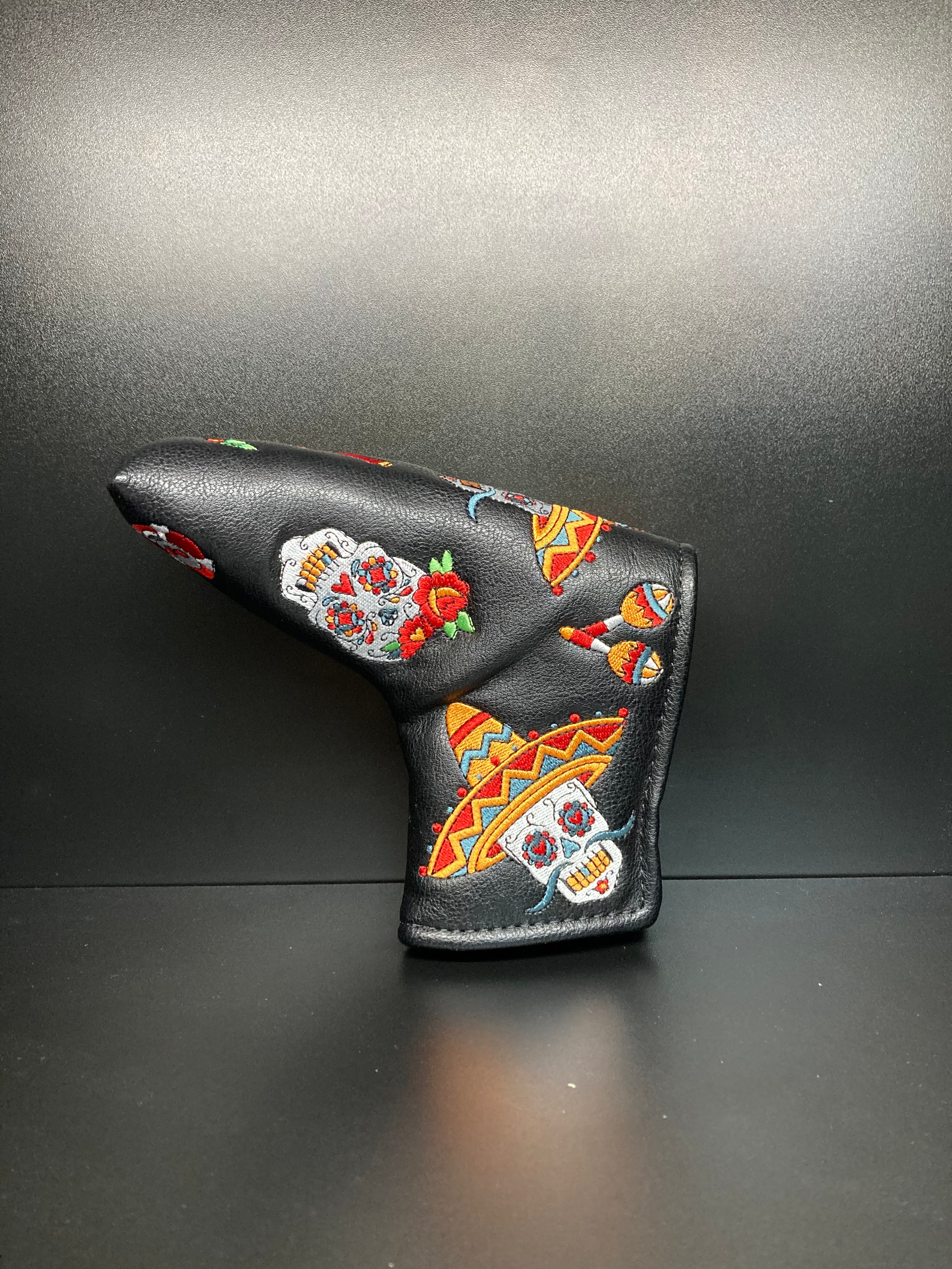 Dia de los Muertos themed golf club headcover by ParWestGolf featuring colorful skull design and festive decorations.