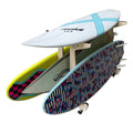 Rado Racks Drop In surfboard storage work bench with padded surf rack for secure board organization and workspace.
