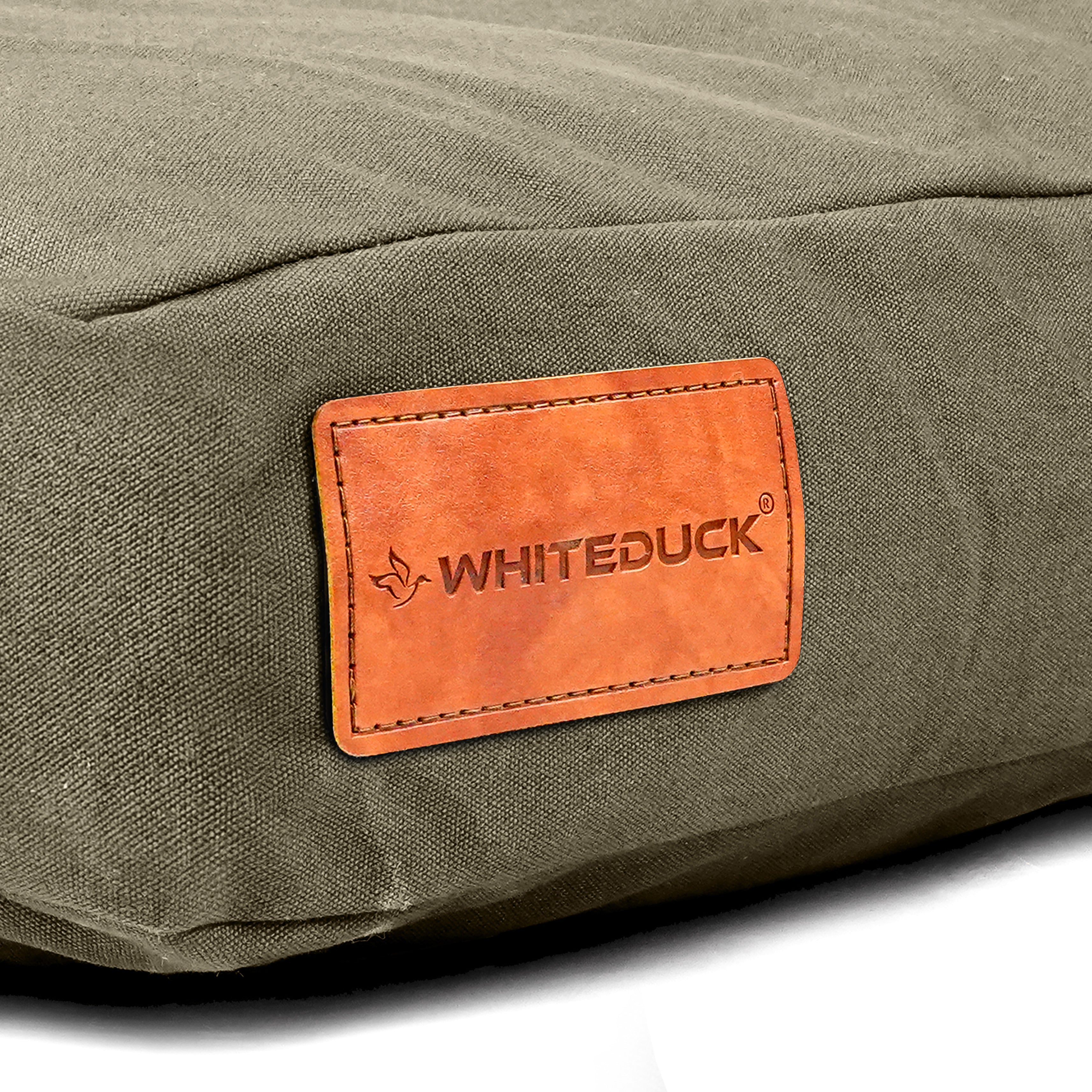 Dusty green White Duck Outdoors pet bed with cushioned interior, designed for comfortable dog lounging.