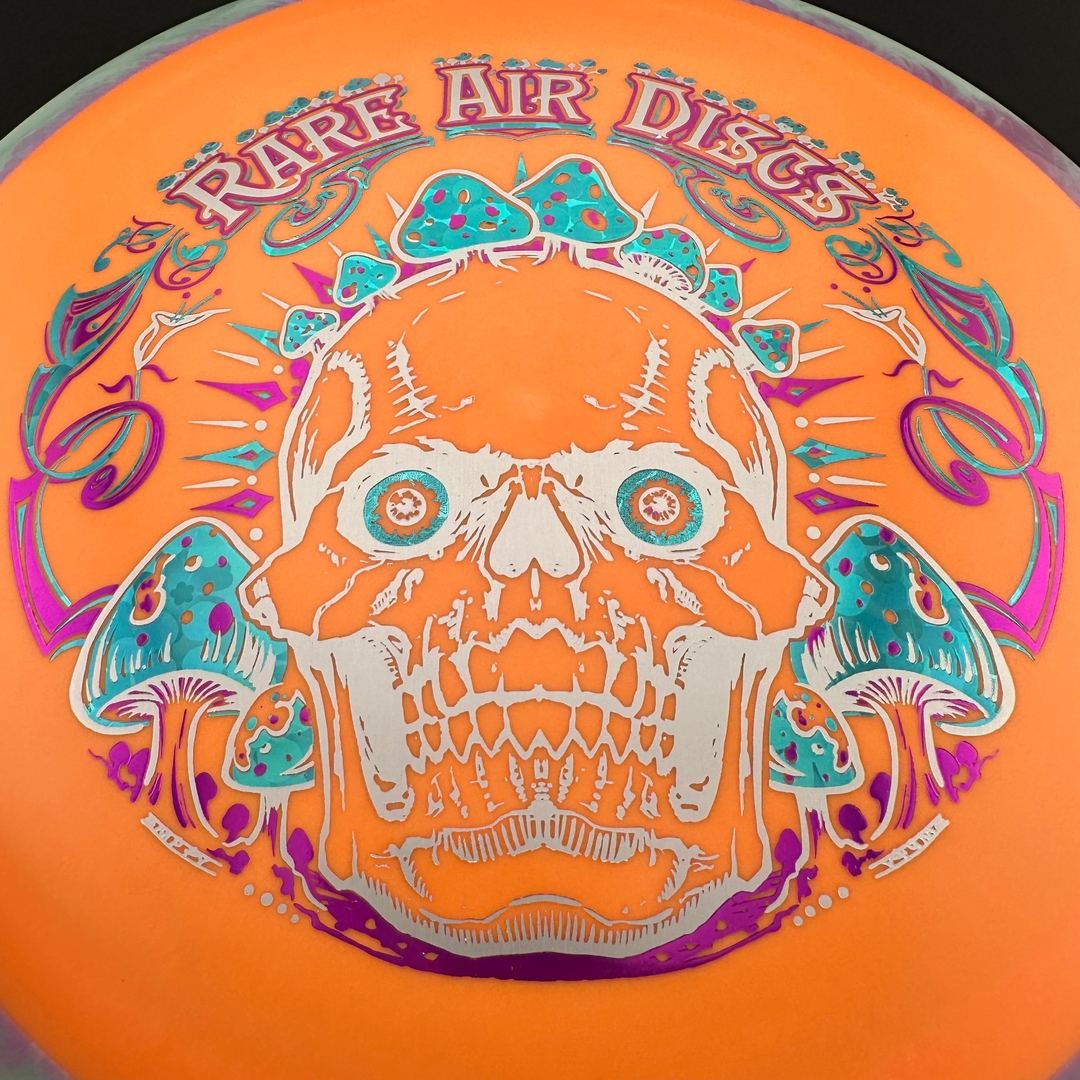 Rare Air Discs Fission Defy Crushin' Amanitas VIP 2.0 disc golf disc with vibrant design and durable plastic for long throws.