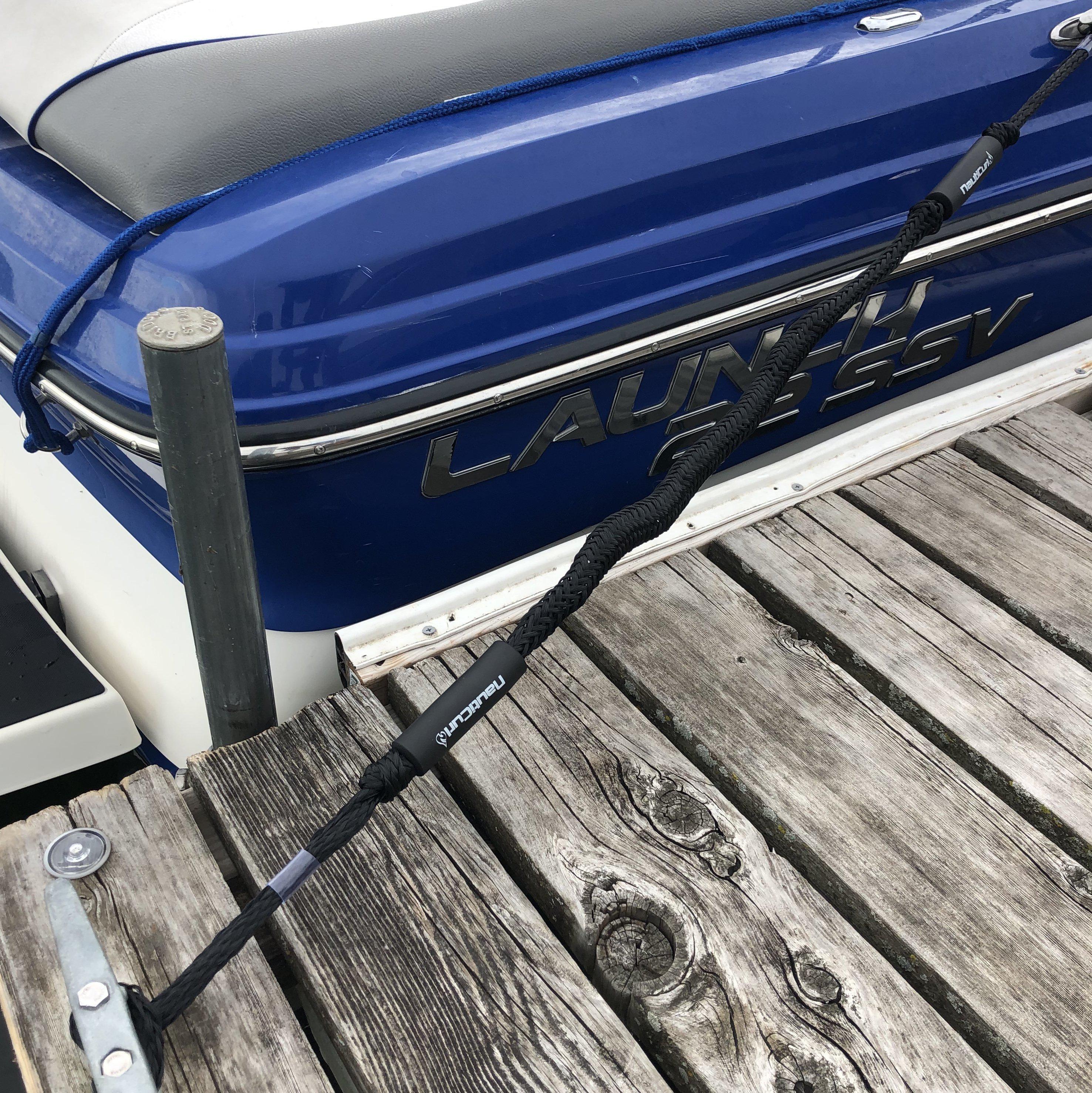 Two NautiCurl LLC shock-absorbing bungee boat ropes with secure hooks, designed for safe watercraft towing and docking.