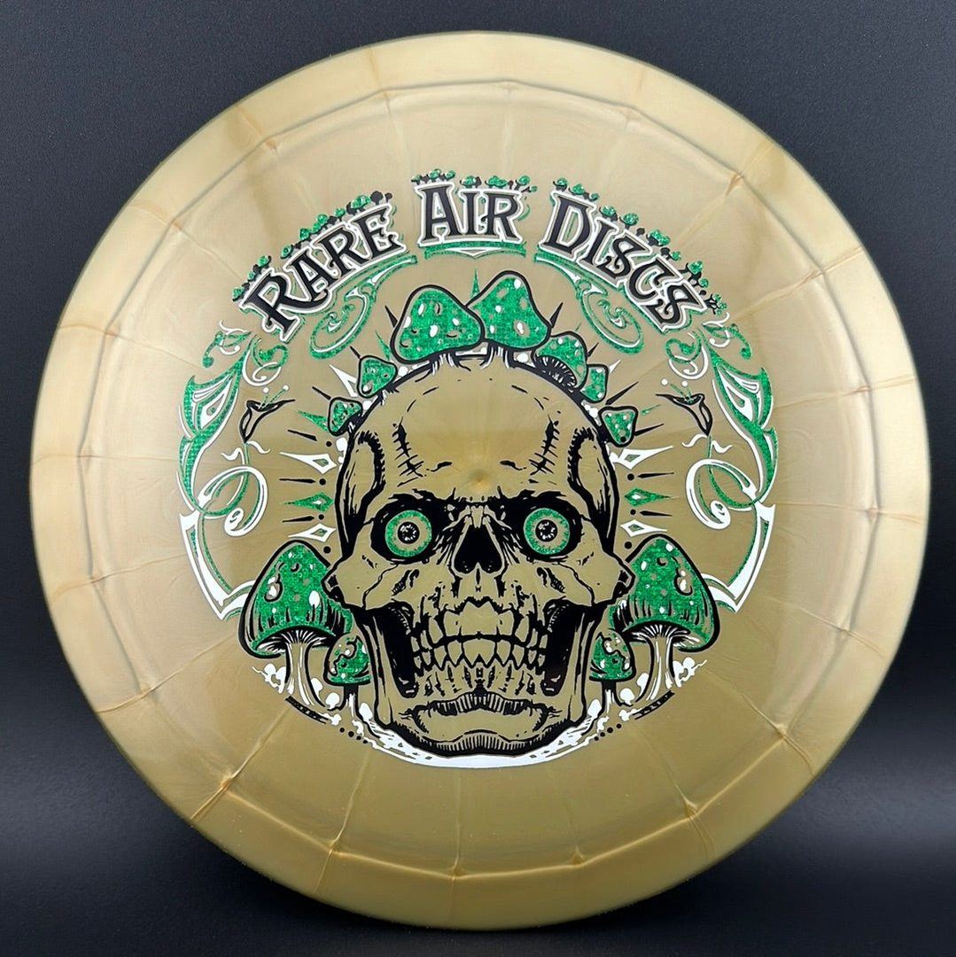 Ethereal Construct Crushin' Amanitas disc golf stamp by Manny Trujillo on a Rare Air Discs disc, featuring colorful mushroom artwork.
