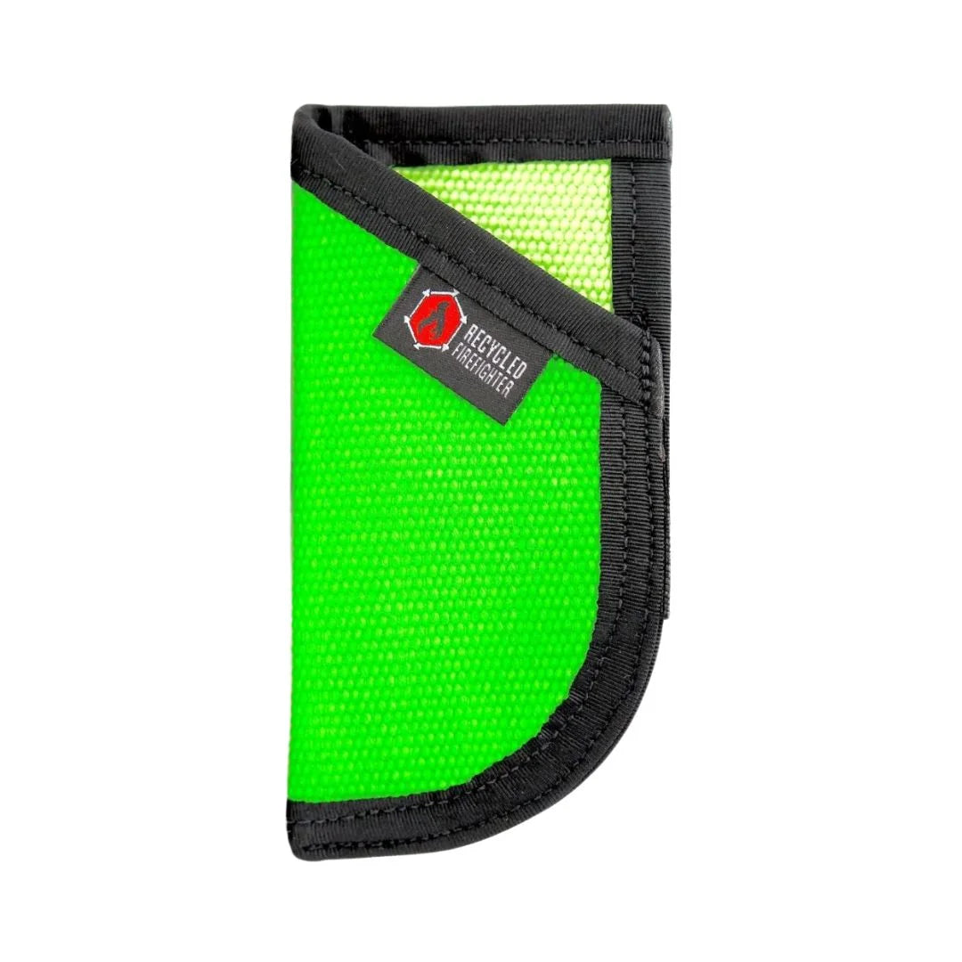 Green and black EDC Pocket Caddy by Recycled Firefighter, featuring durable recycled hose material and organized compartments.