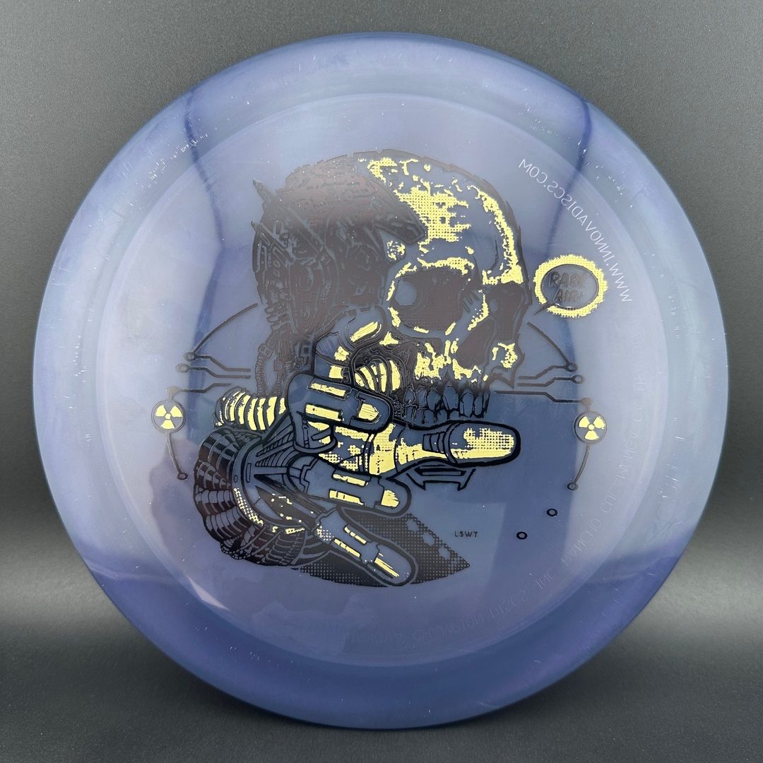 Disc golf Gummy C-Blend Aztec disc by Rare Air Discs, featuring vibrant colors and detailed Aztec design on the plastic surface.