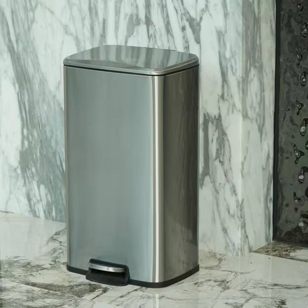 HomePacific 8-gallon stainless steel kitchen trash can with step-on lid, sleek design and durable metal finish.