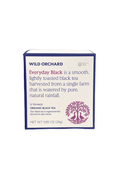 Organic Black Tea Bag from Wild Orchard, showcasing a black tea bag with a string and tag, ready for brewing.