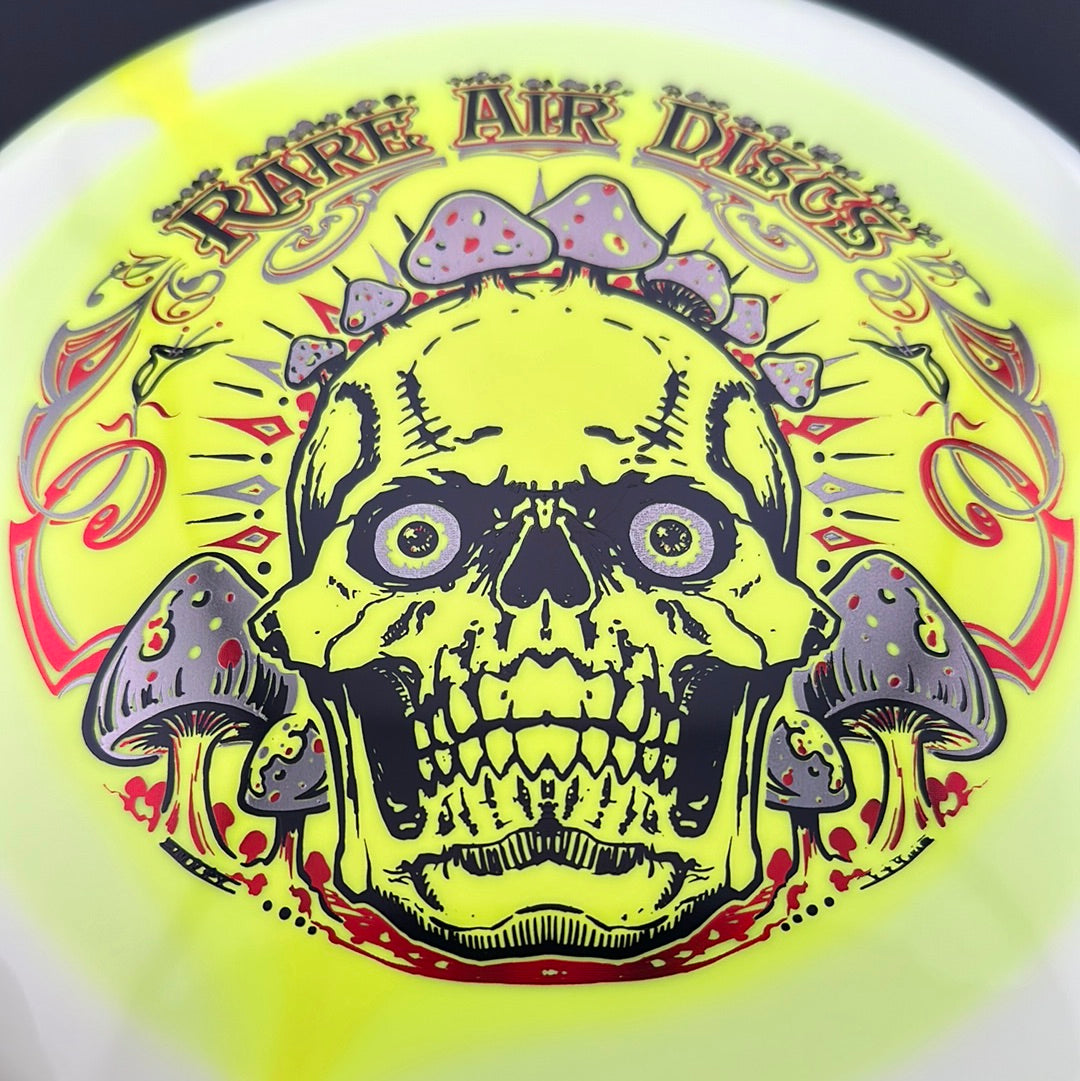 Rare Air Discs Halo S-Blend Conqueror disc golf disc featuring Crushin' Amanitas artwork in vibrant colors.