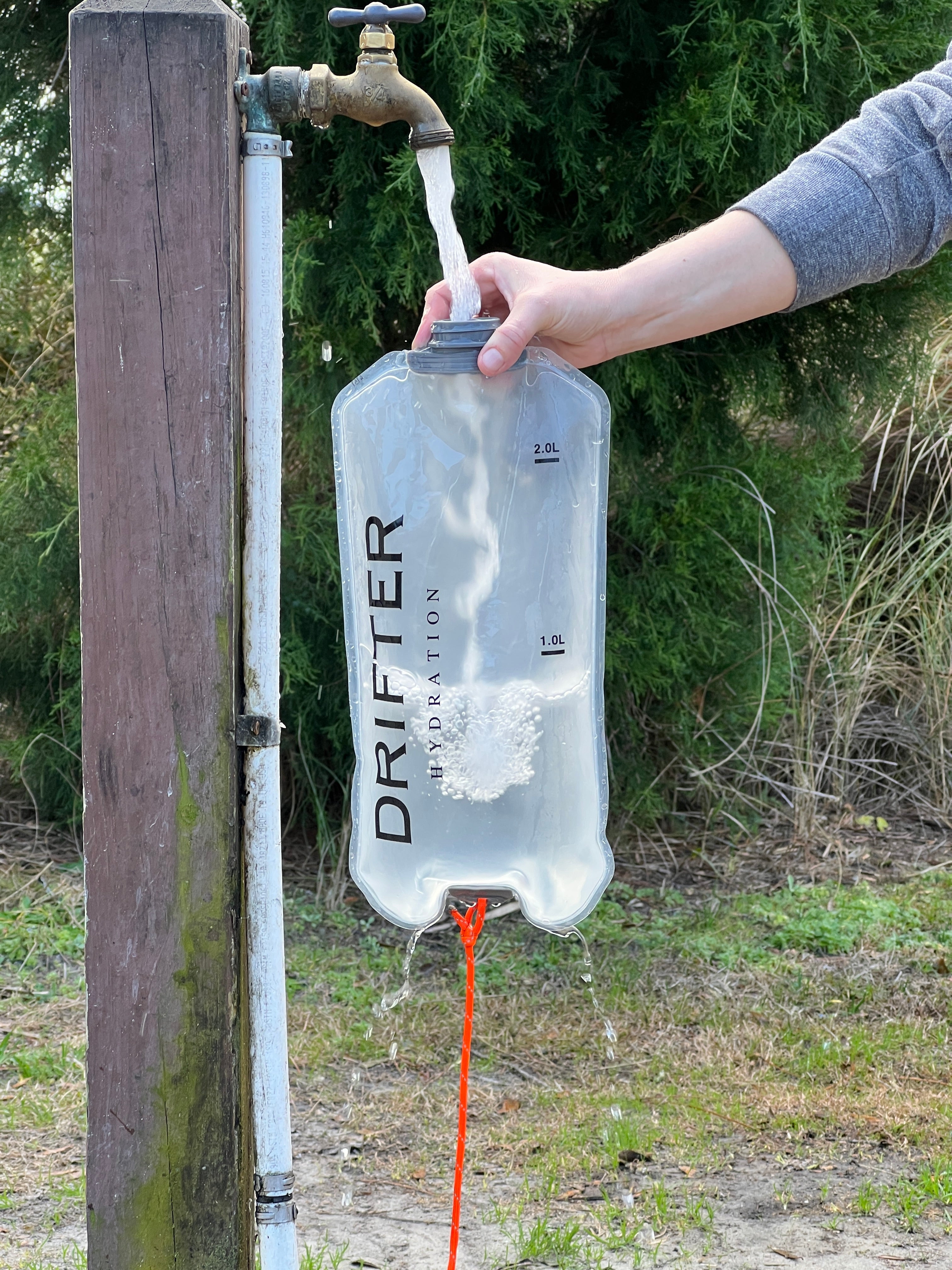 Drifter Hydration Transporter Water Bag with adjustable strap and large capacity for outdoor hydration needs.