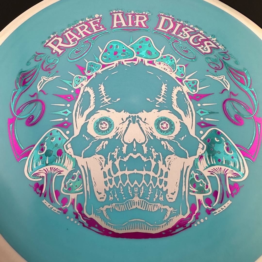 Fission Defy Crushin' Amanitas VIP 2.0 disc golf disc by Rare Air Discs, featuring vibrant design and durable construction.