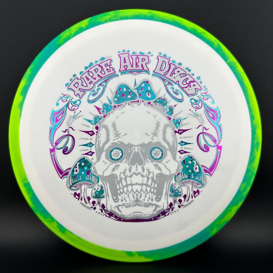 Rare Air Discs Fission Defy Crushin' Amanitas VIP 2.0 disc golf disc with colorful design and bold branding.