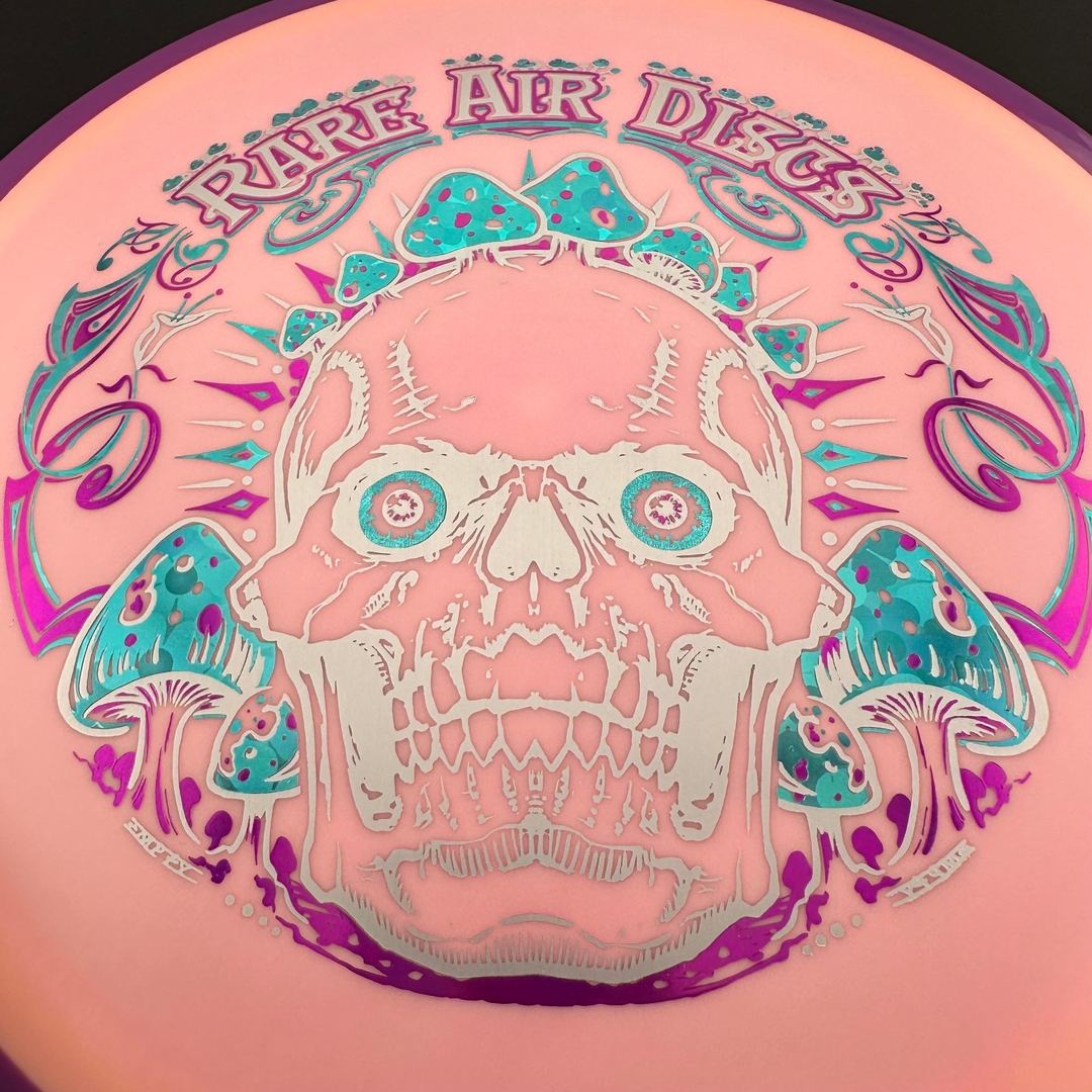 Fission Defy Crushin' Amanitas VIP 2.0 disc golf disc by Rare Air Discs, featuring vibrant design and durable construction.