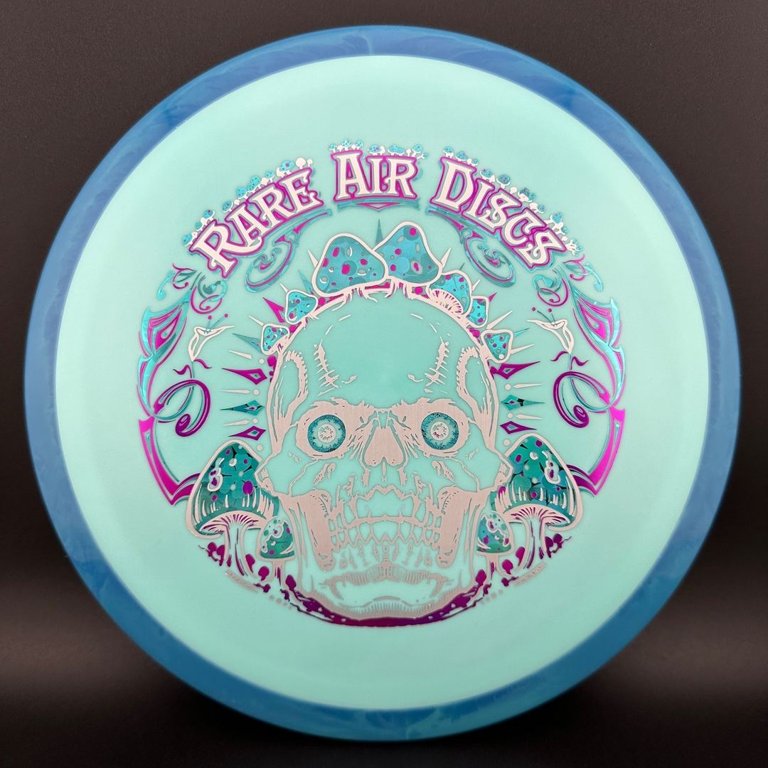 Rare Air Discs Fission Defy Crushin' Amanitas VIP 2.0 disc golf disc with vibrant design and bold graphics.
