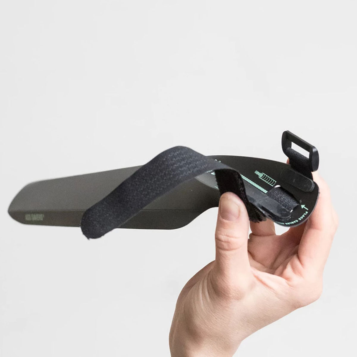 ZEITBIKE ASS SAVERS Speed Mullet front mudguard in black attached to bike tire, designed for mountain or road bikes.