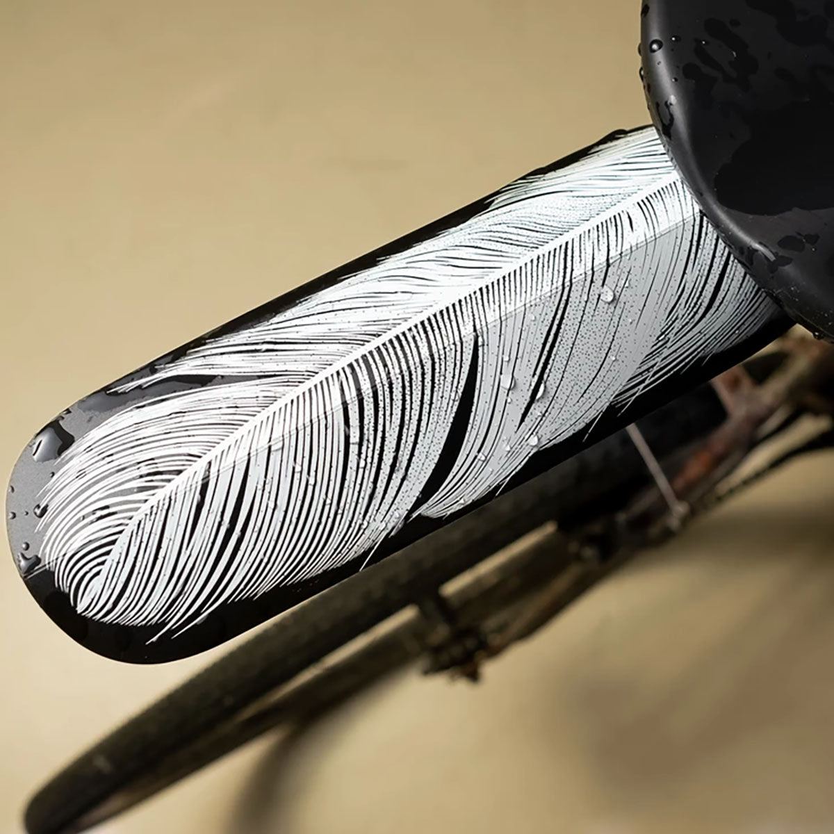 ZEITBIKE ASS SAVERS Regular Size rain fenders in white attached to bicycle wheel, protecting from splashes and mud.