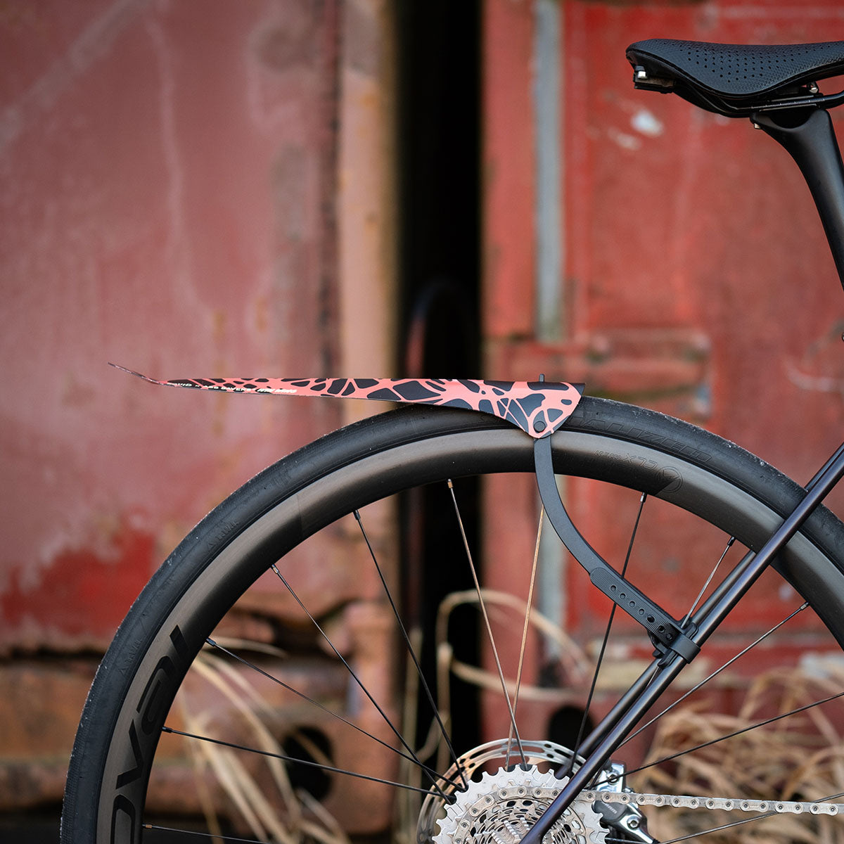 ZEITBIKE Ass Savers Win Wing 2 road rear mudguard with black wishbone mounted on bike wheel for protection from road debris.