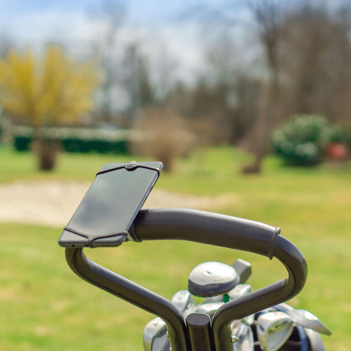 ZEITBIKE FINN universal golf phone mount holder attached to a golf cart for secure smartphone placement during play