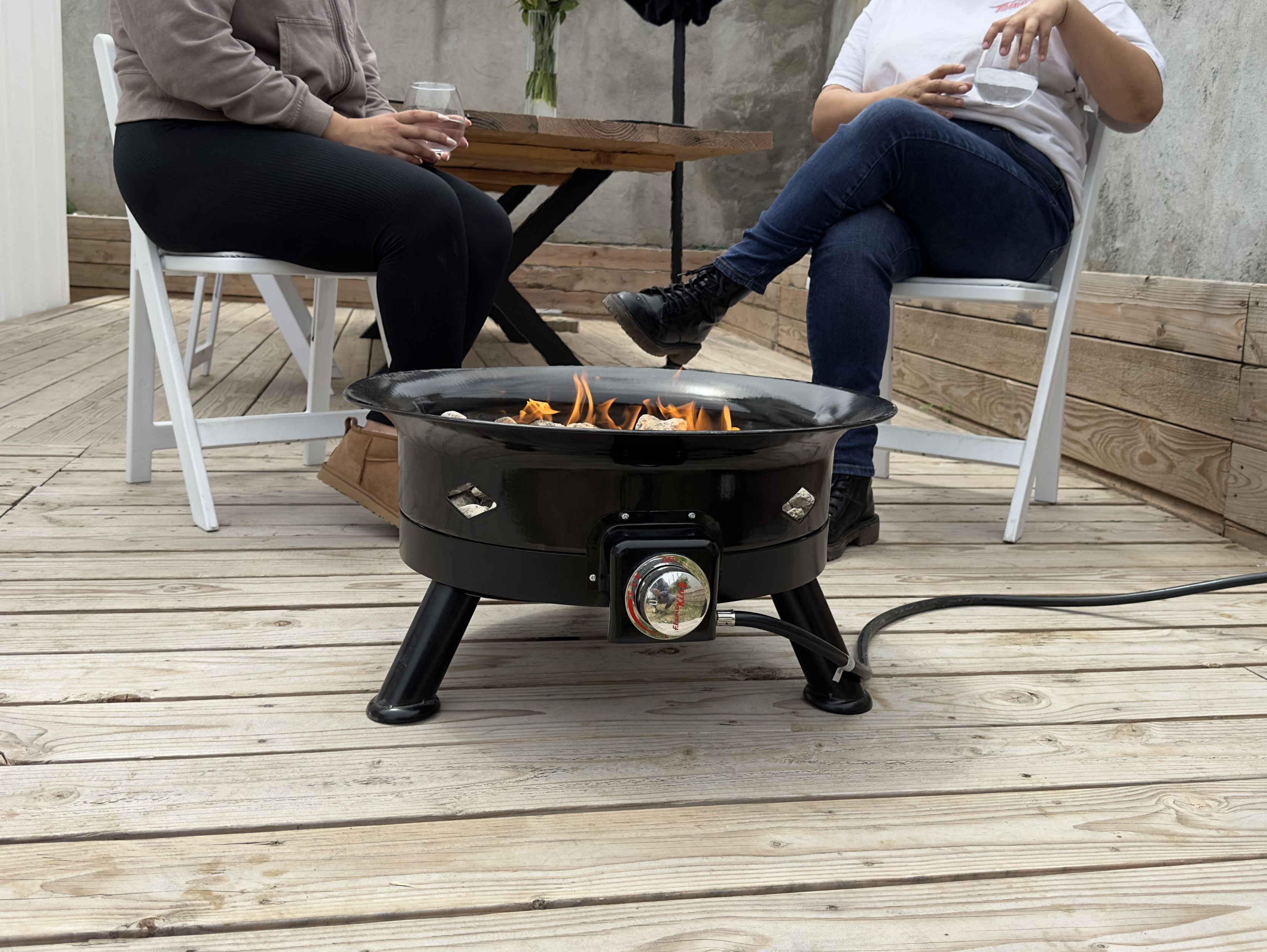 Flame King outdoor portable propane fire pit bowl with self igniter, cover, and carry straps, 24-inch outdoor heating and fire feature.