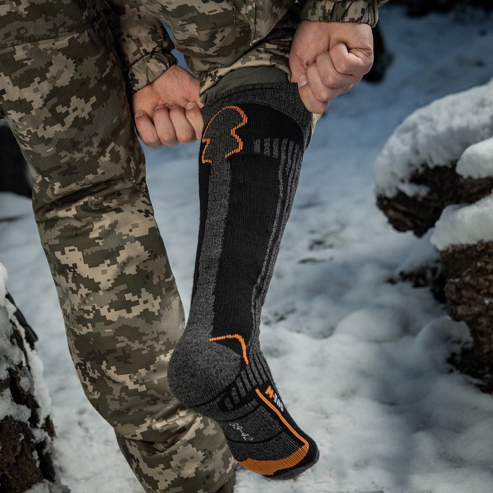 M-TAC Coolmax long mid calf socks in a stylish design, showcasing breathable fabric and comfortable fit.
