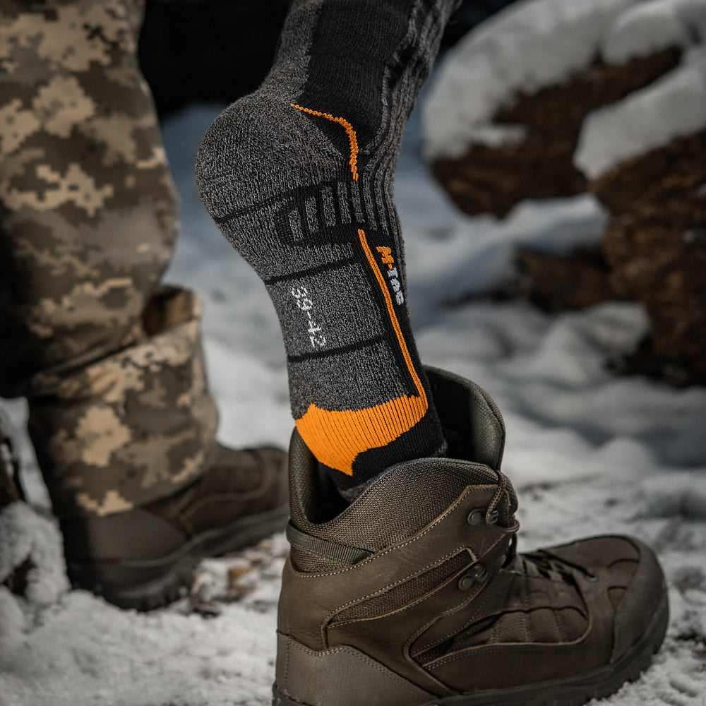 M-Tac mid calf socks made with Coolmax fabric, featuring a breathable design ideal for comfort and moisture control.