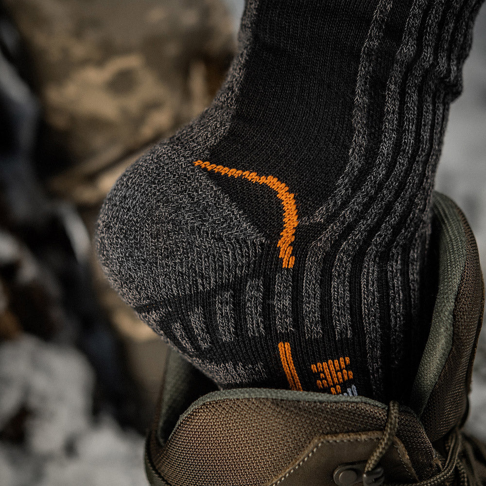 M-TAC Coolmax mid calf socks in a long design, featuring breathable fabric for comfort and moisture-wicking performance.