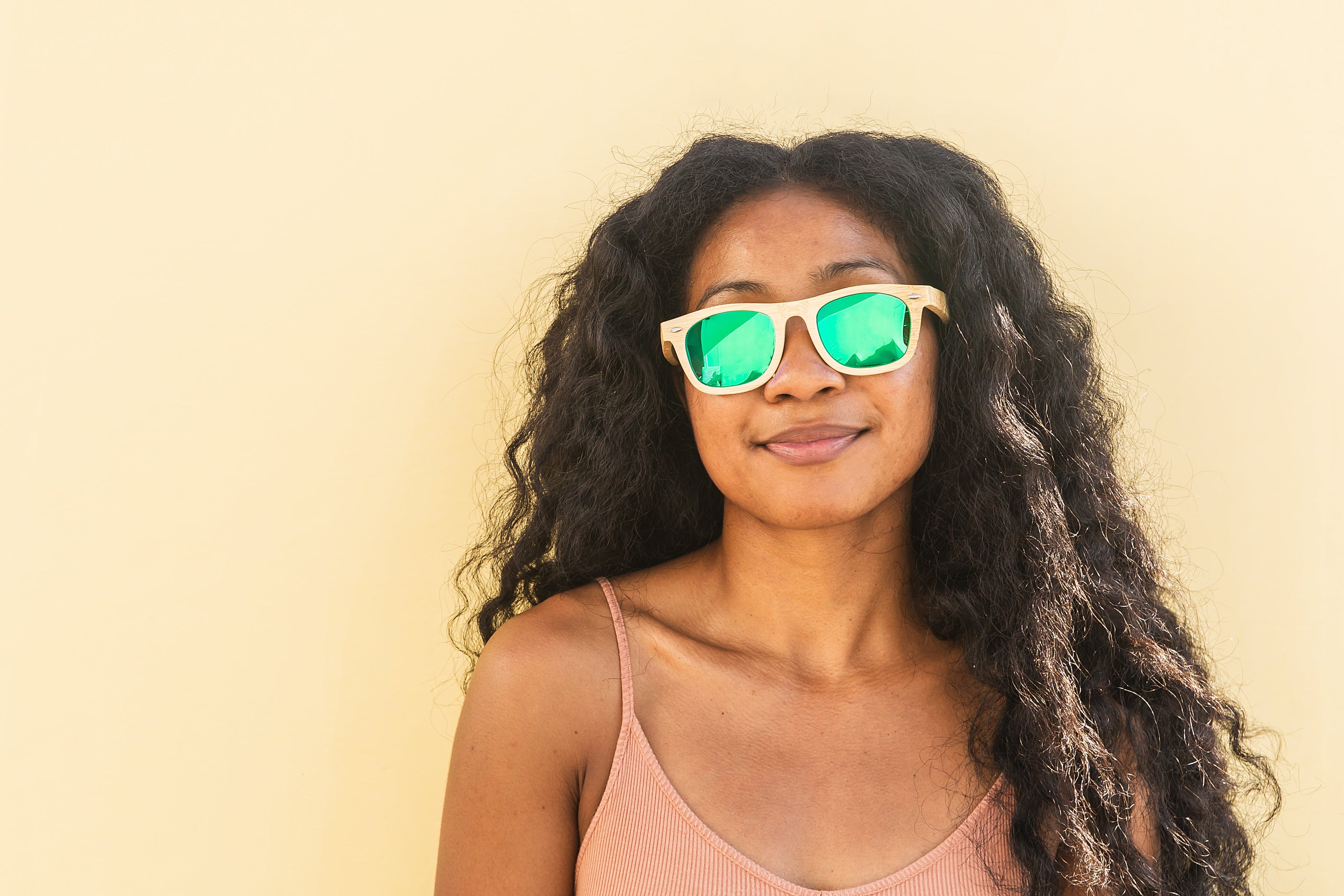 Bamboo floating sunglasses by Eastern Outer with round frames and polarized lenses, designed for water activities.