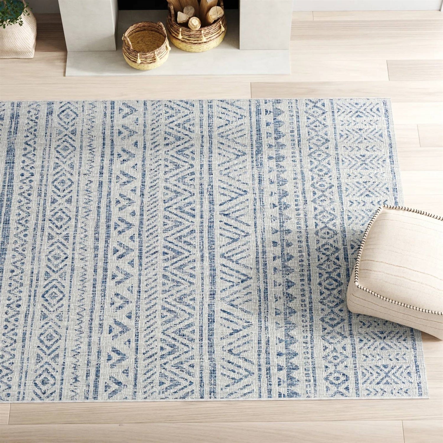 Blue grey chevron coastal boho style indoor outdoor area rug by HomePacific, 4 ft. by 6 ft., with a modern geometric pattern.