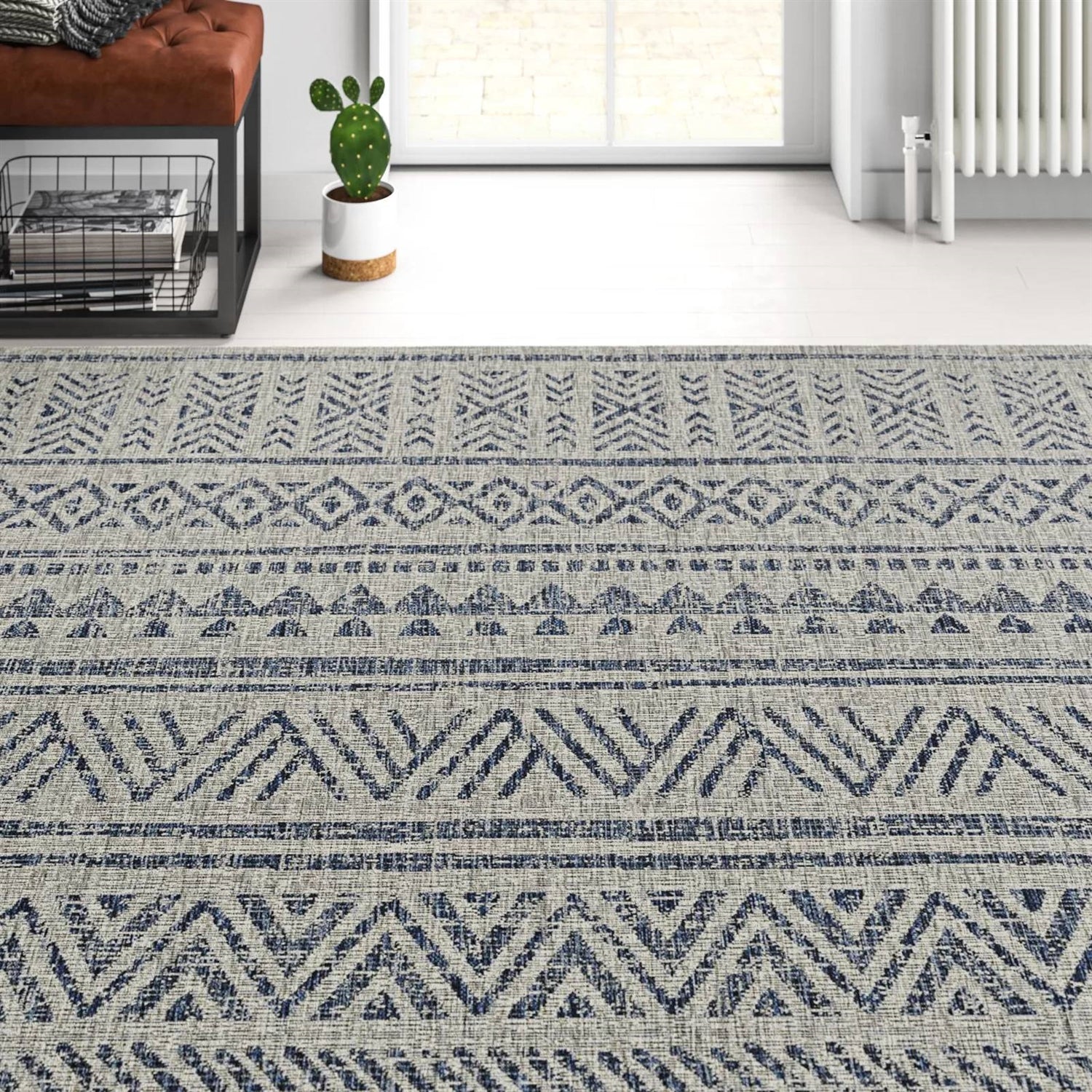 Blue grey chevron coastal indoor outdoor area rug by HomePacific, 4 ft. x 6 ft., with boho style design and textured pattern.