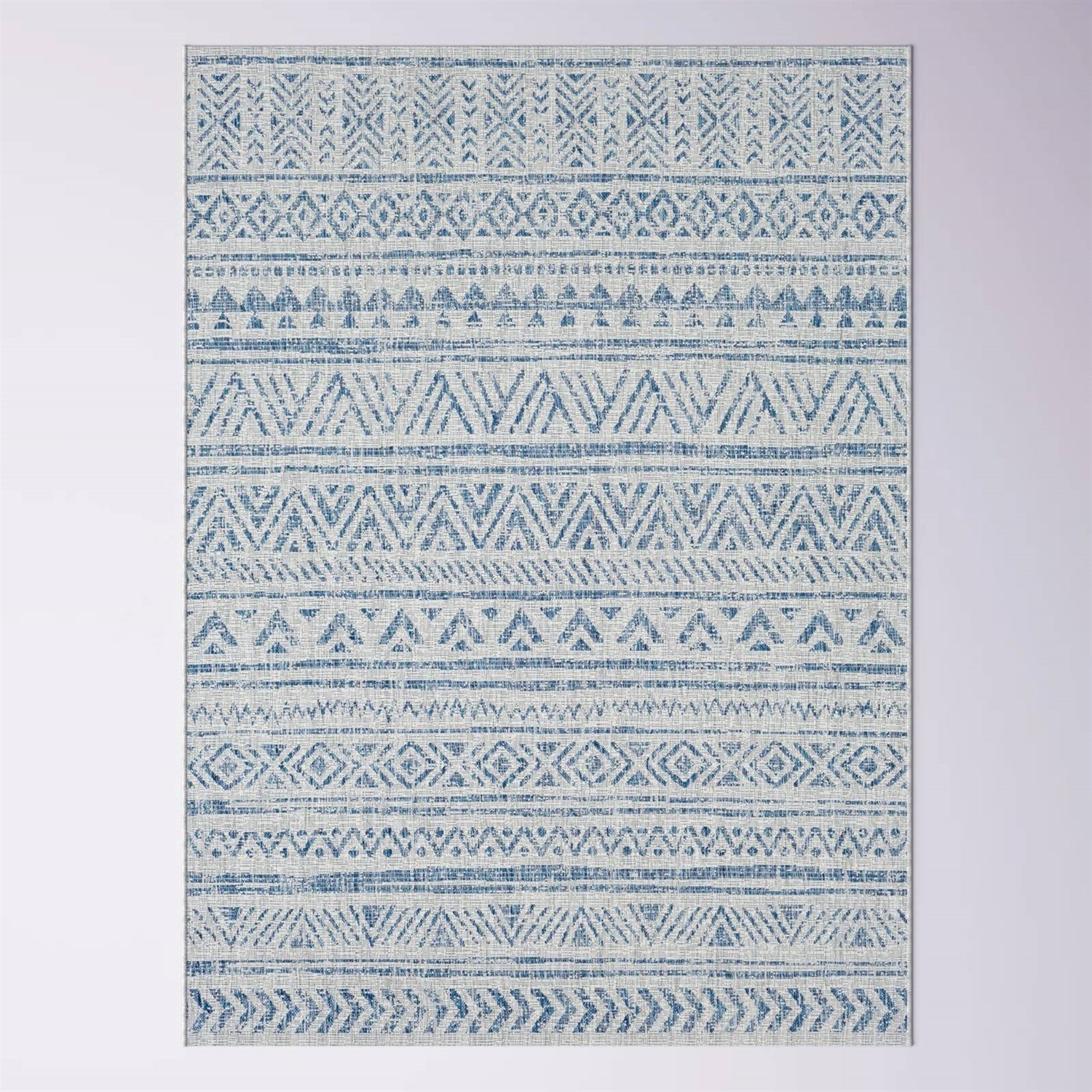 Blue grey chevron coastal boho style indoor outdoor area rug from HomePacific, featuring a 4 ft. by 6 ft. geometric rug design.