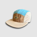 Tan and teal crushable 5-panel camper hat by Faultline395, featuring a lightweight, foldable design with adjustable strap.