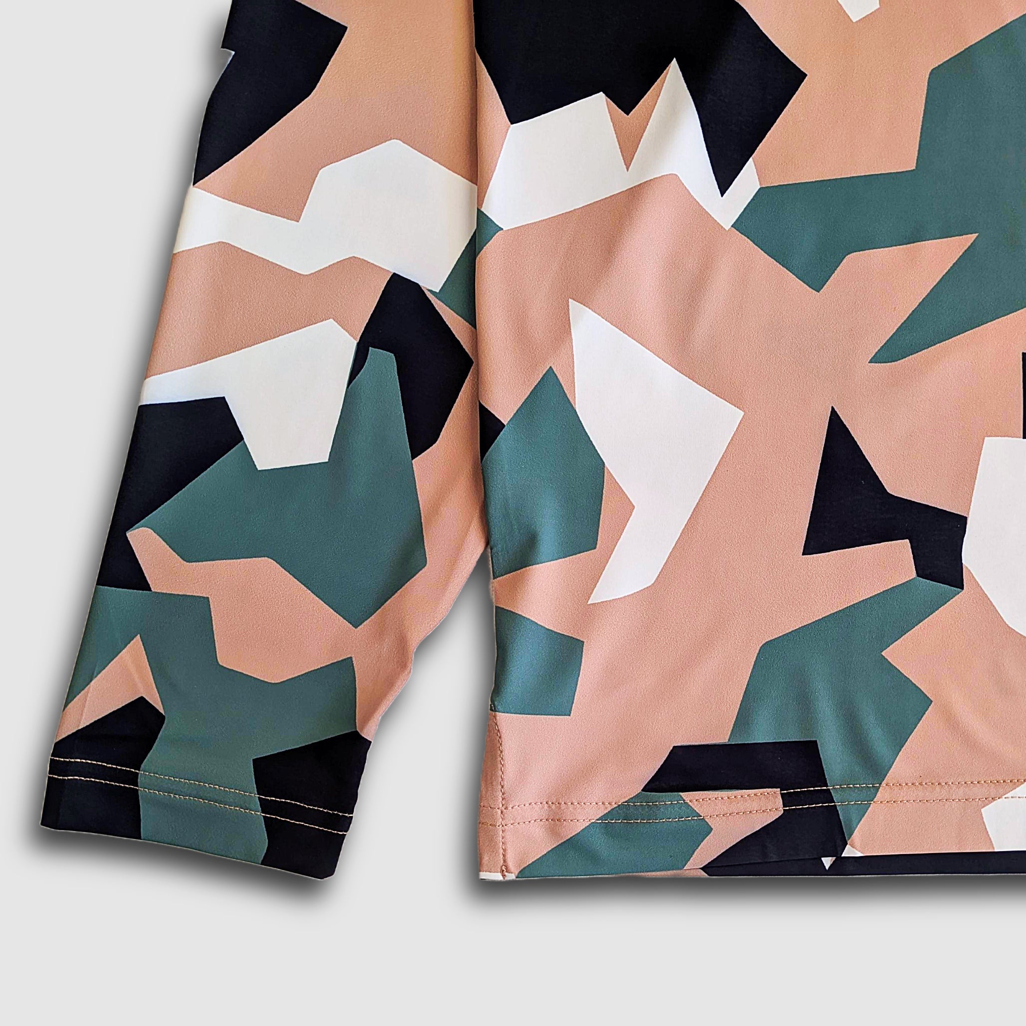 Faultline395 Carson Sun Hoodie in tan, green, and black with Swedish camo pattern and hood, casual outdoor sun protection.