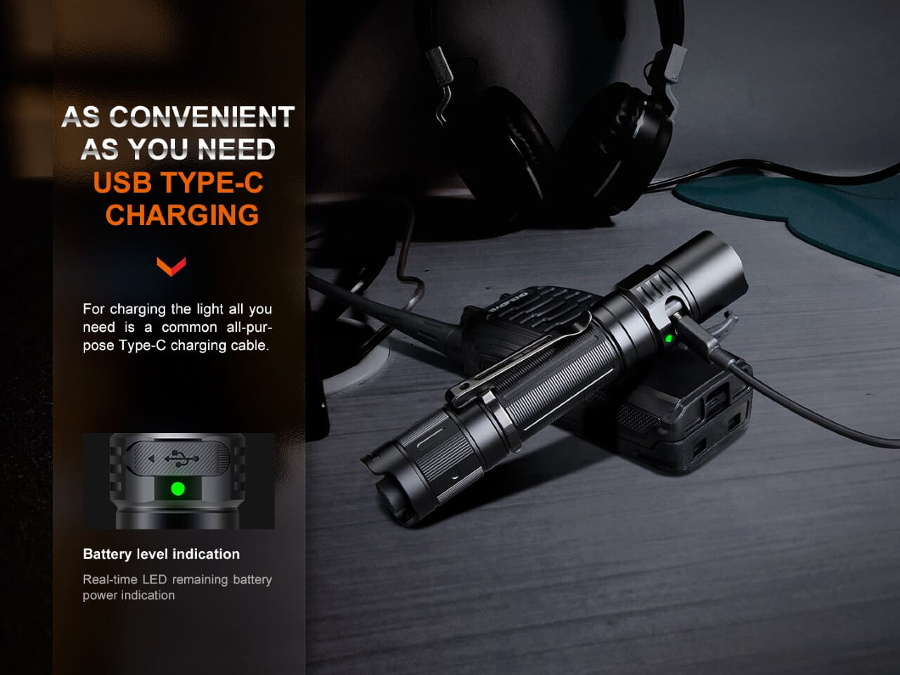 Fenix PD35R compact rechargeable tactical flashlight charging on a surface with a visible charging indicator.