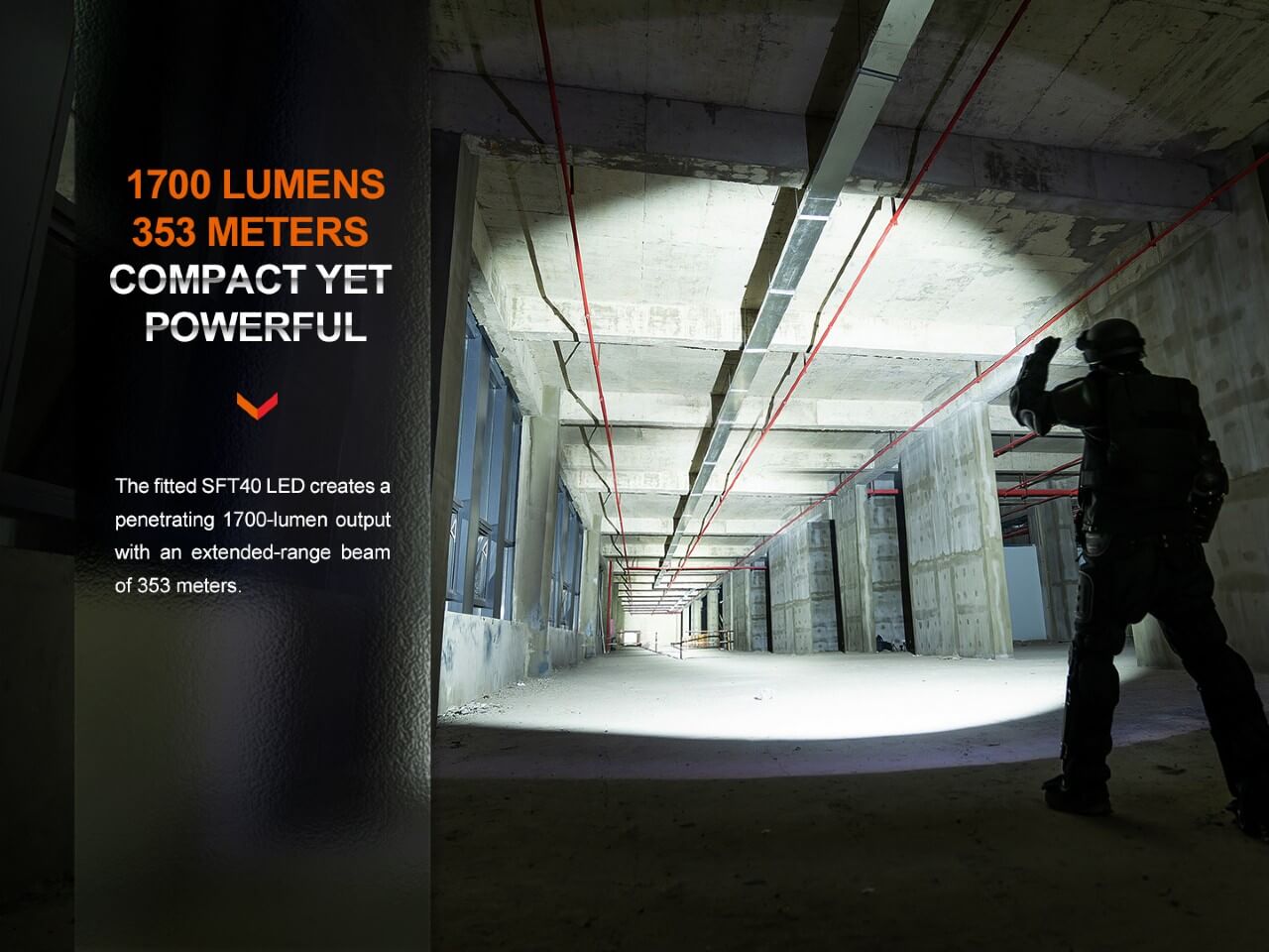 Fenix PD35R compact rechargeable tactical flashlight shown shining brightly in a dark outdoor setting.