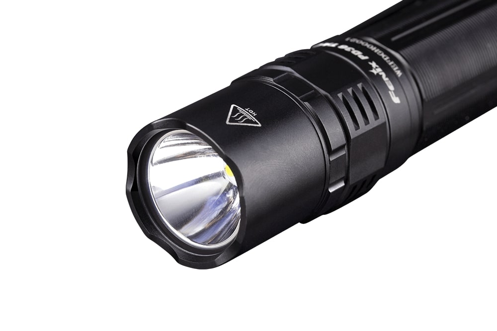 Fenix PD36 TAC tactical flashlight showcasing a sleek design and powerful 3000 lumens output in a front view.