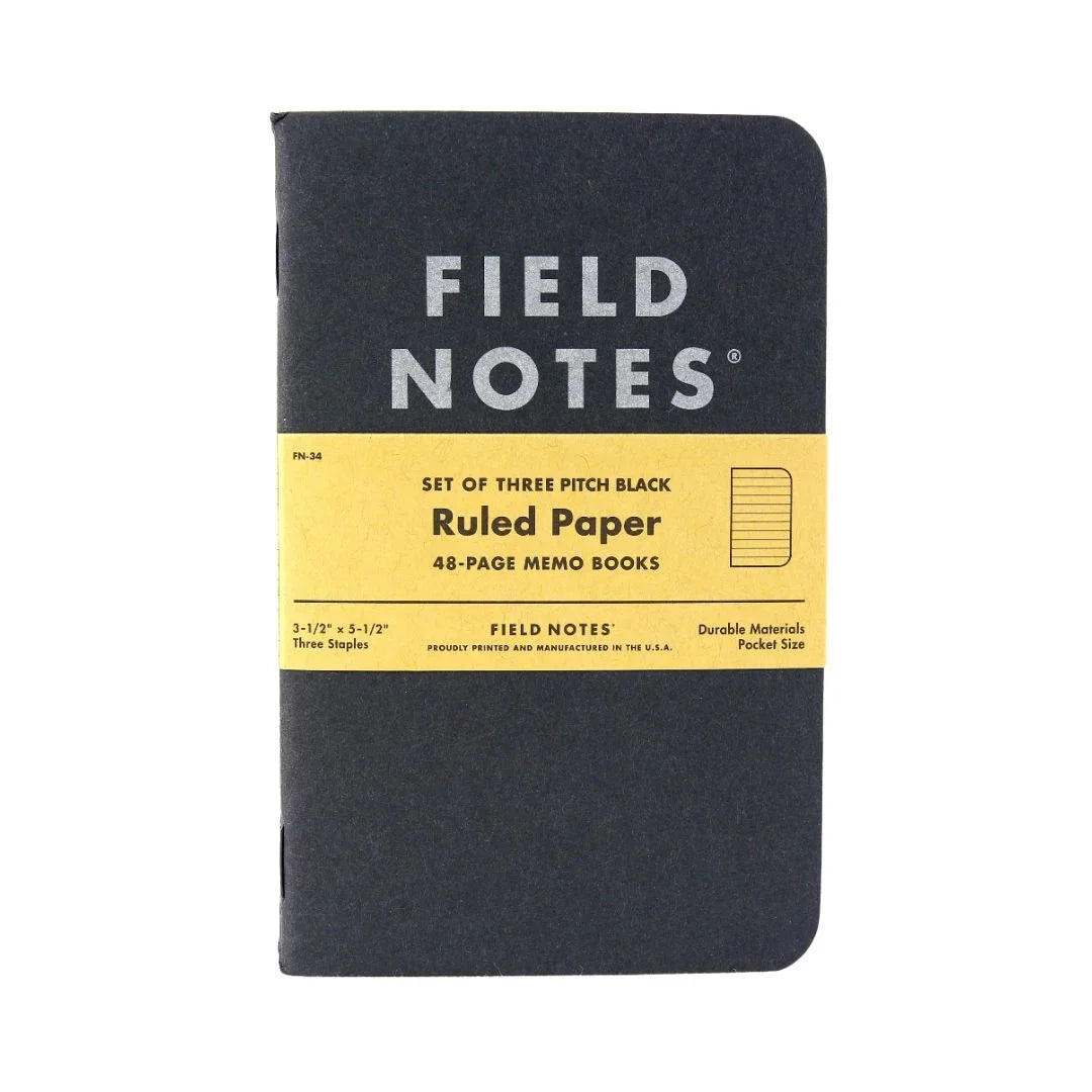 Recycled Firefighter Field Notes notebook with black graph paper, three-pack, compact and durable for note-taking and organization.