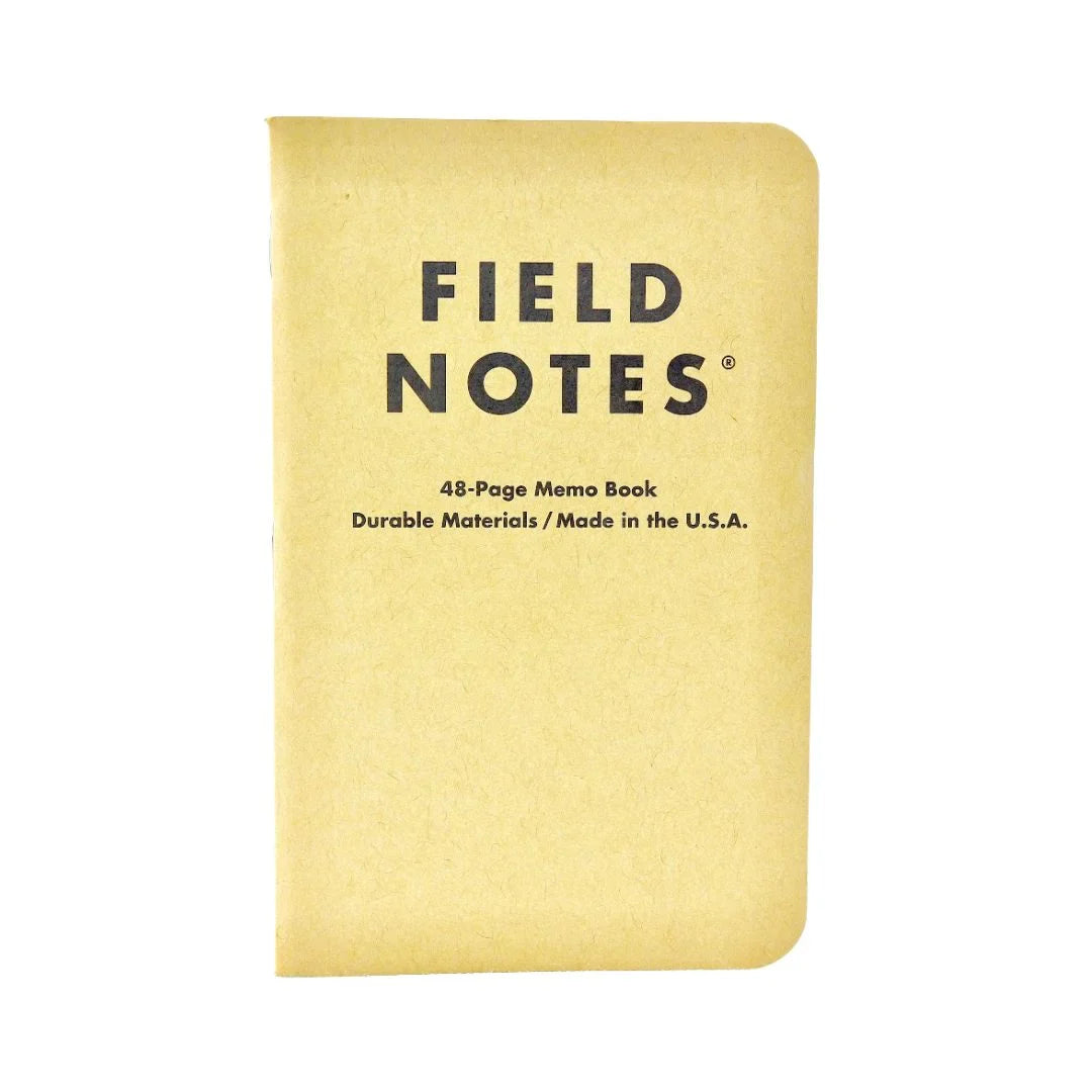 Recycled Firefighter Field Notes notebook with kraft cover and graph paper, perfect for note-taking and sketching.