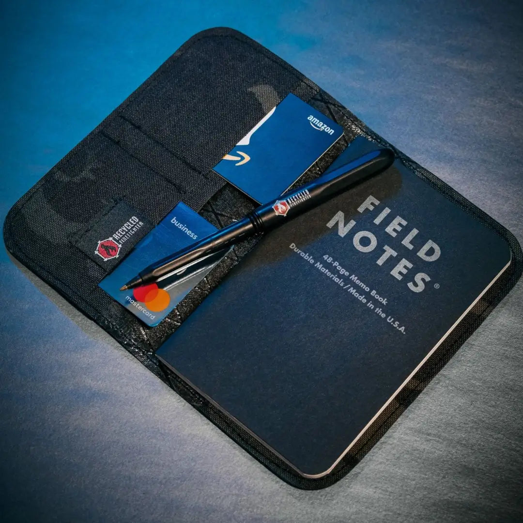 Recycled Firefighter Field Notes Wallet made of recycled materials, compact design with multiple card slots and a cash pocket.