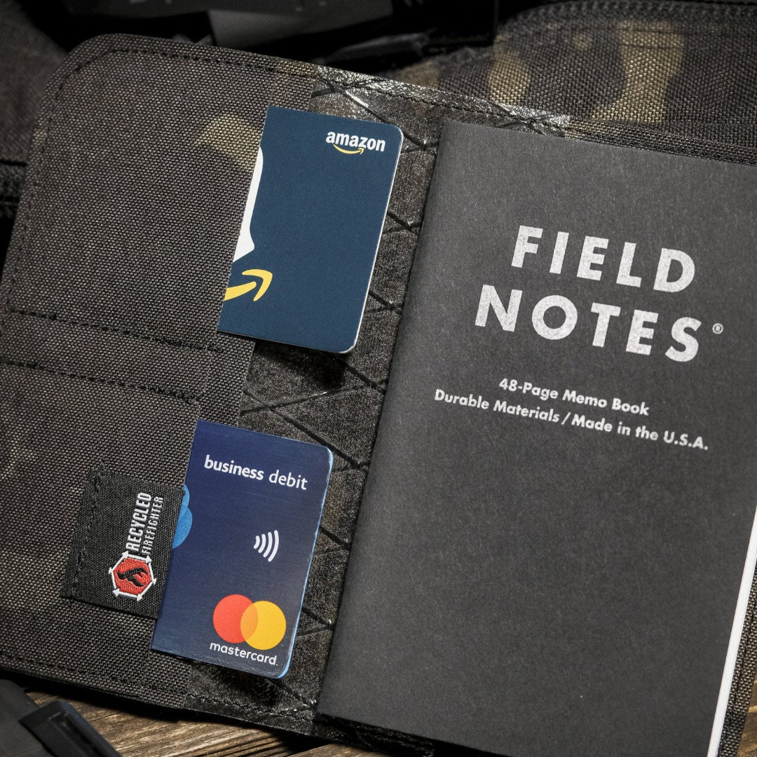 Recycled Firefighter Field Notes Wallet made from recycled materials, compact design with multiple card slots and a cash pocket.